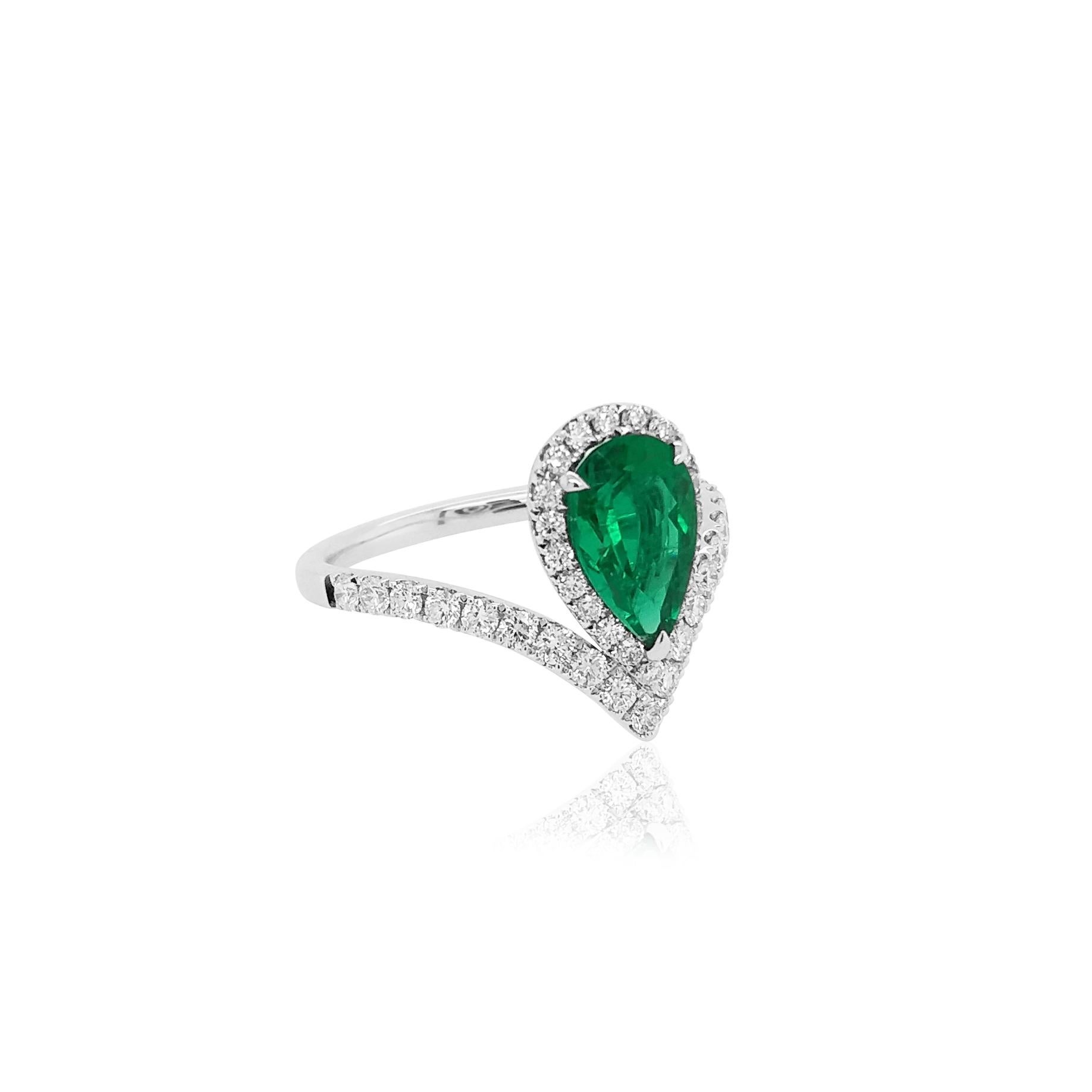 Modernist IGI Certified Pear Shape Colombian Emerald and White Diamond Platinum Ring For Sale