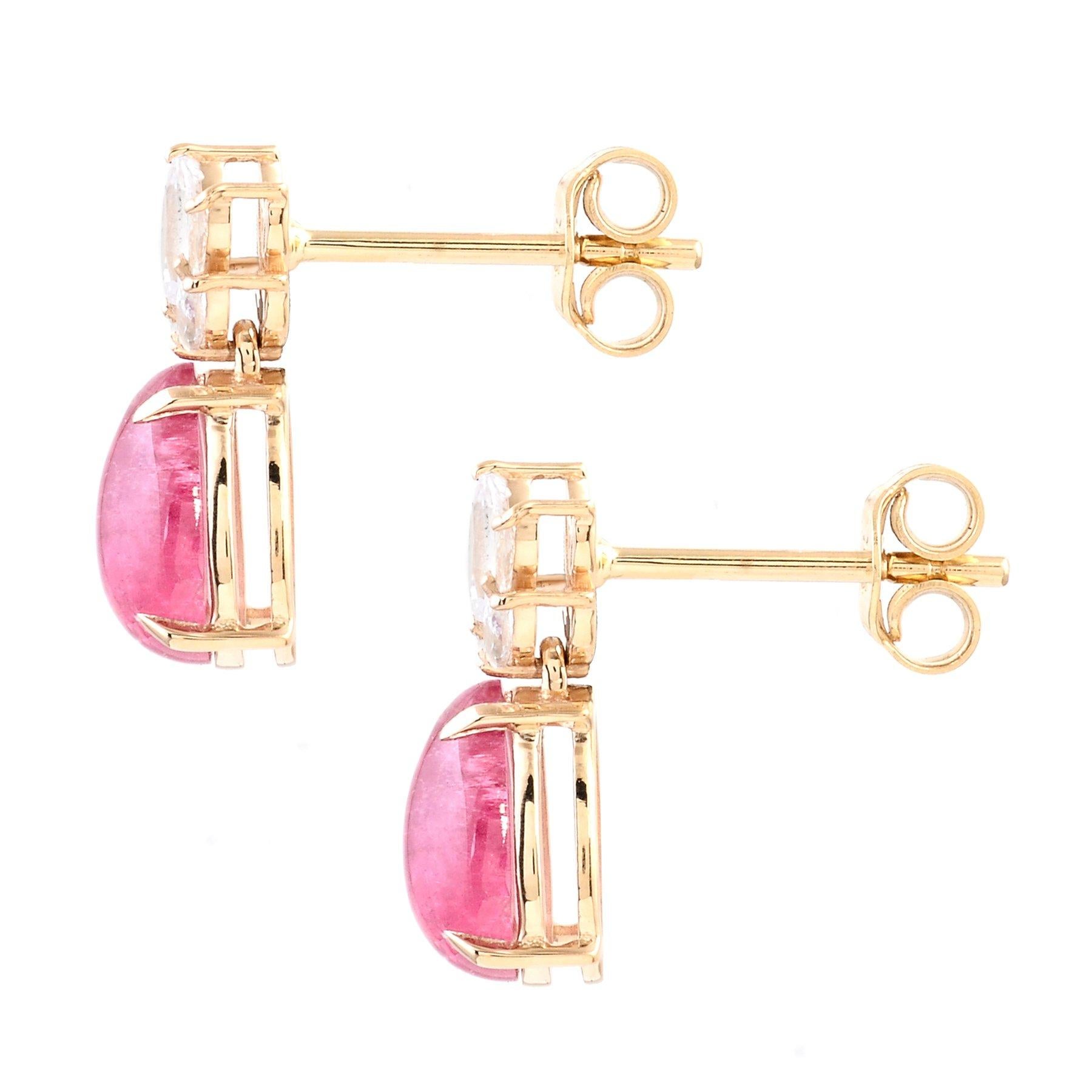 A pair of deep pink 2.18 Carat Rubellite & Sapphire 14K Gold Earrings that give that extra feminine touch!

These luxurious 14K yellow gold tourmaline earrings showcase a perfect blend of elegance and craftsmanship. This exquisite piece features two