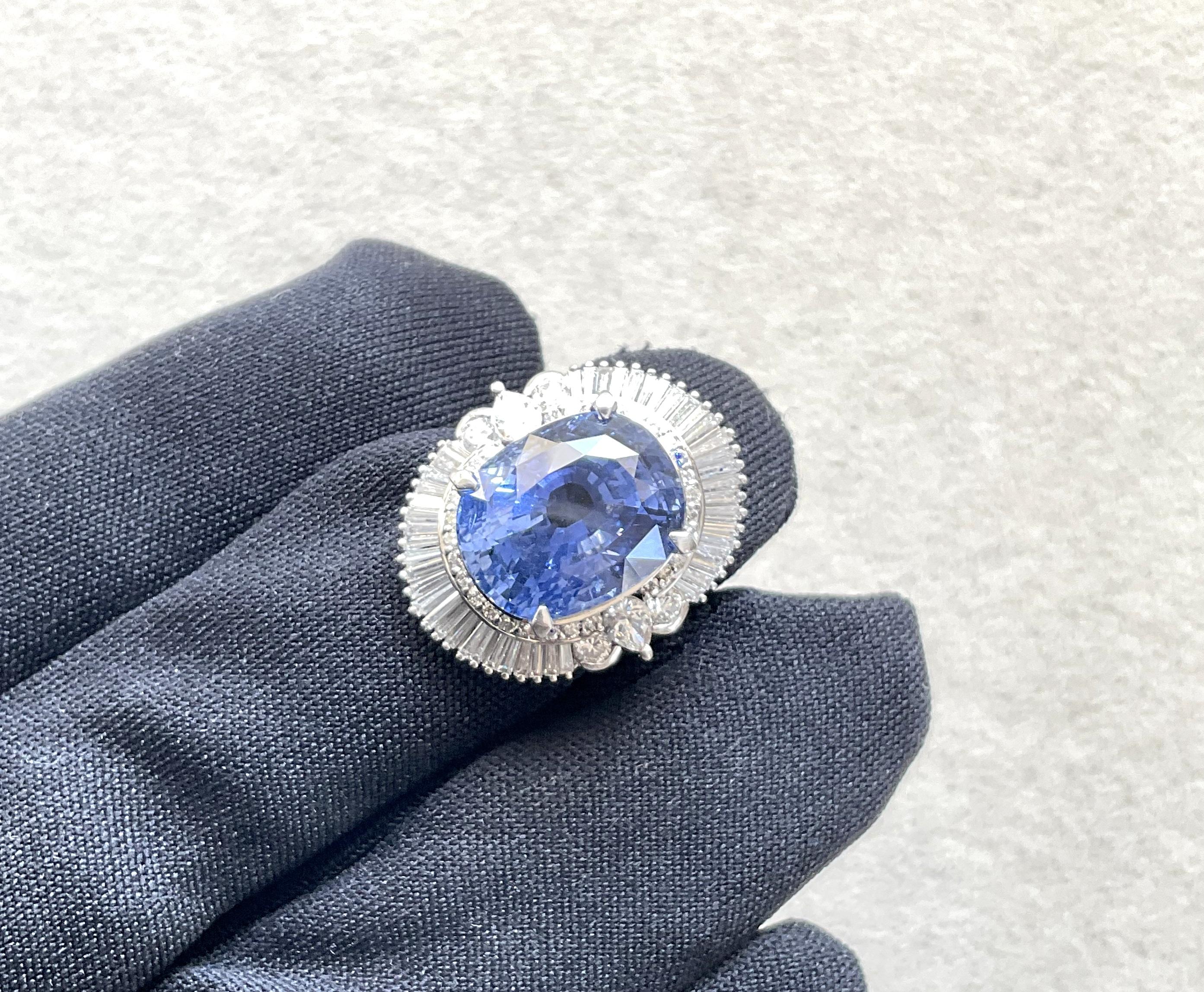 Platinum Burma Blue Sapphire 17.40 Carats With 2.00 Carats Natural Diamond Ring

Gemstone - Blue Sapphire
Stone weight - 17.40 carats
Natural Diamond Weight: 2.00 carats total
Platinum Weight -  16.59 Grams
Total Gross Ring Weight - 20.47 grams
