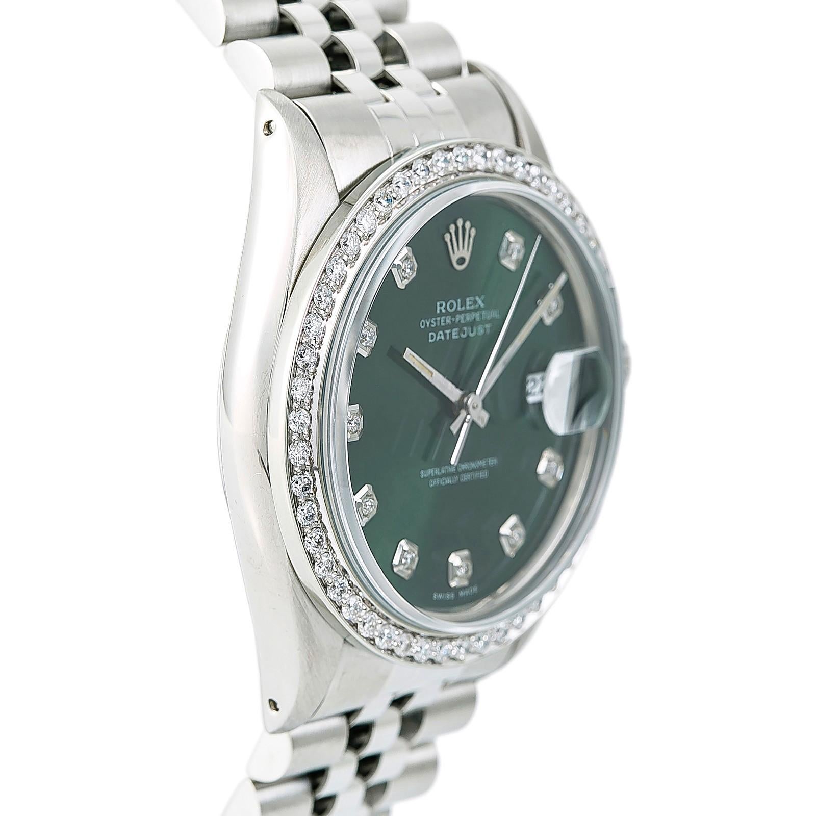 silver rolex with green face