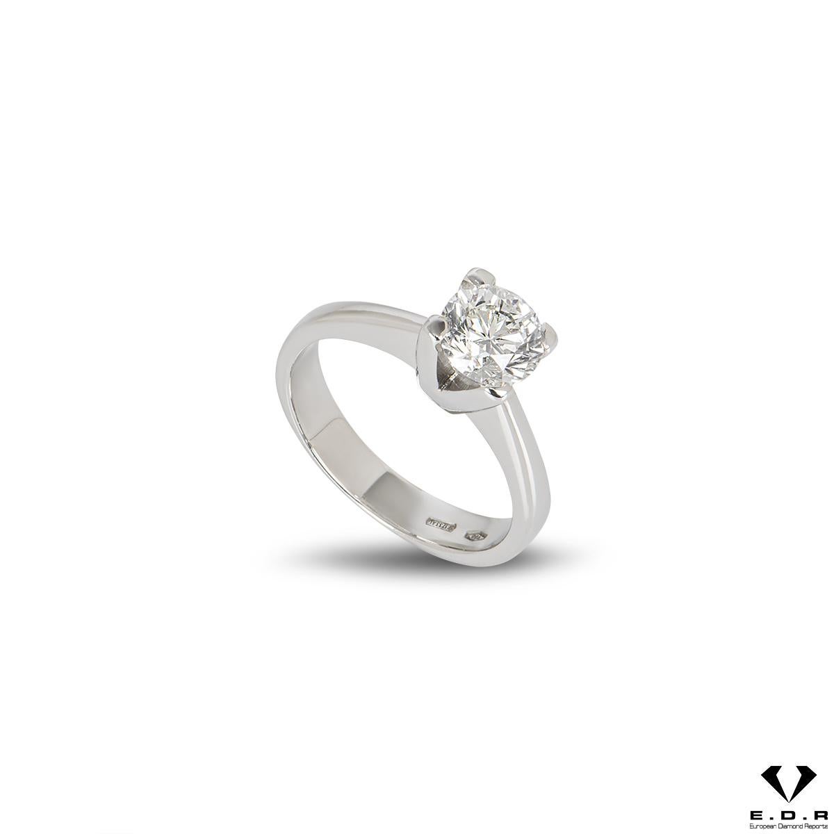 An 18k white gold diamond ring. The round brilliant cut diamond weighs 0.91ct, is F in colour and VVS2 clarity, set within a classic 4 claw mount. The ring is currently a size UK H, EU 46 and US 3¾ but can be adjusted for a perfect fit and has a