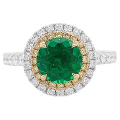Anello con smeraldo colombiano taglio rotondo, diamante giallo e diamante bianco certificato IGI