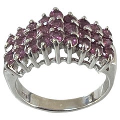 Bague signée ronde en grenat naturel certifié