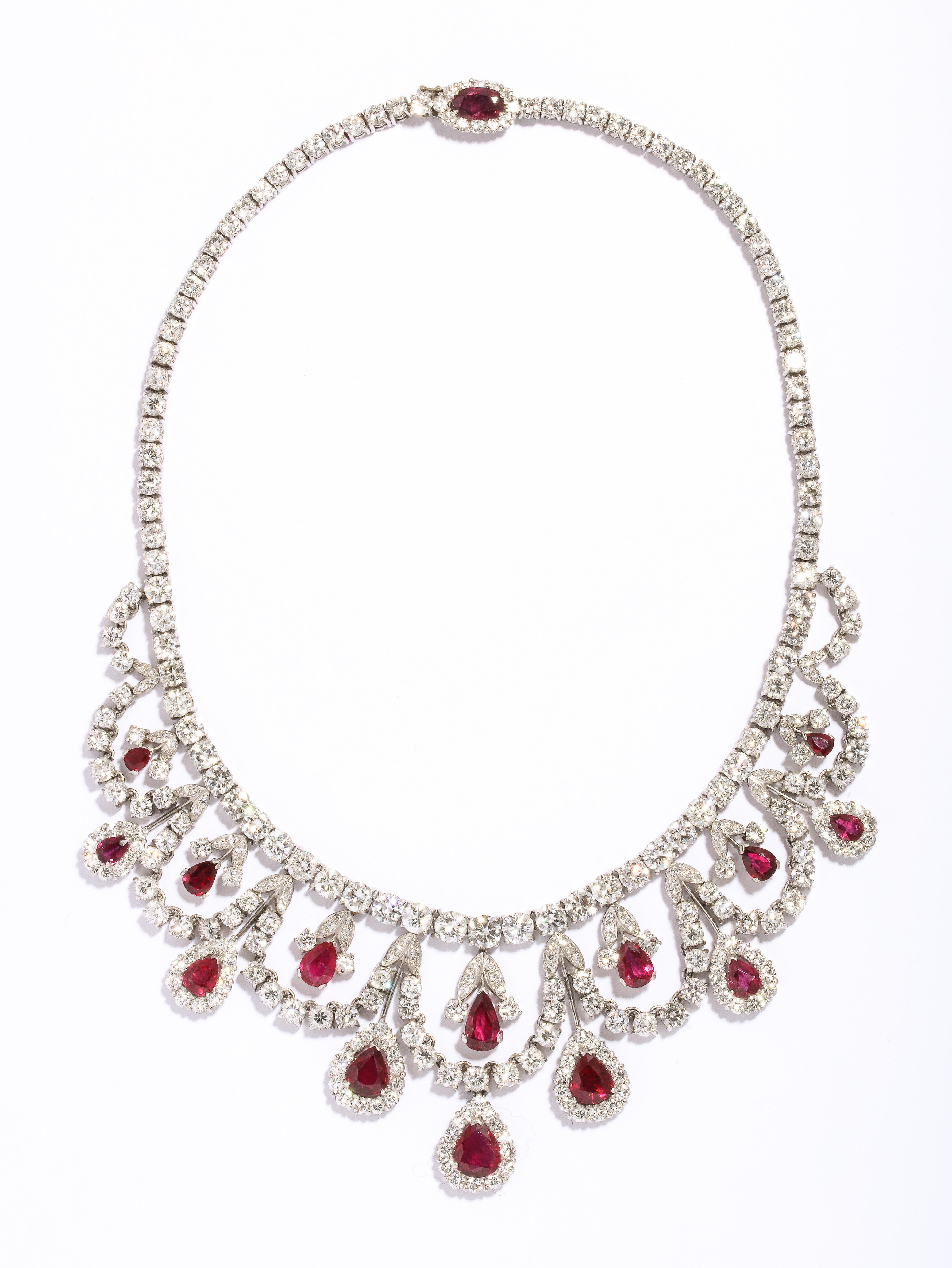 AGL Certified Ruby & Diamond Necklace 
Larger Rubies: 5.13 Cts
Smaller Rubies: 13.36 Cts
Diamond Weight: Approximately 45.00 Cts
Measurements: 15