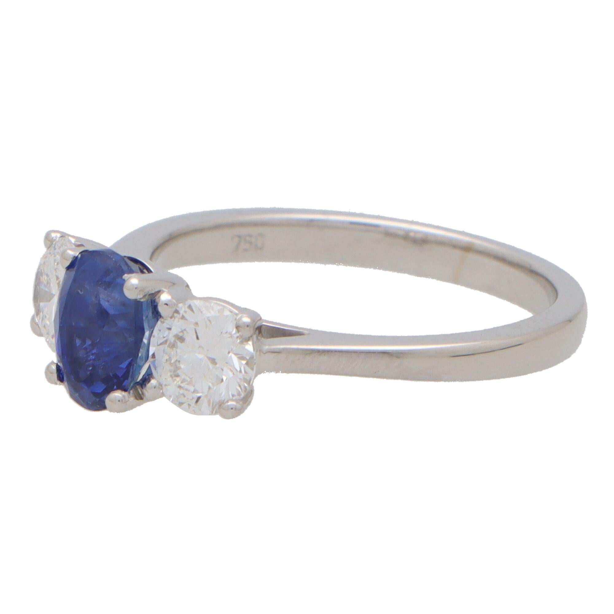 Modern Certified Sapphire and Diamond Three Stone Ring Set in 18k White Gold For Sale