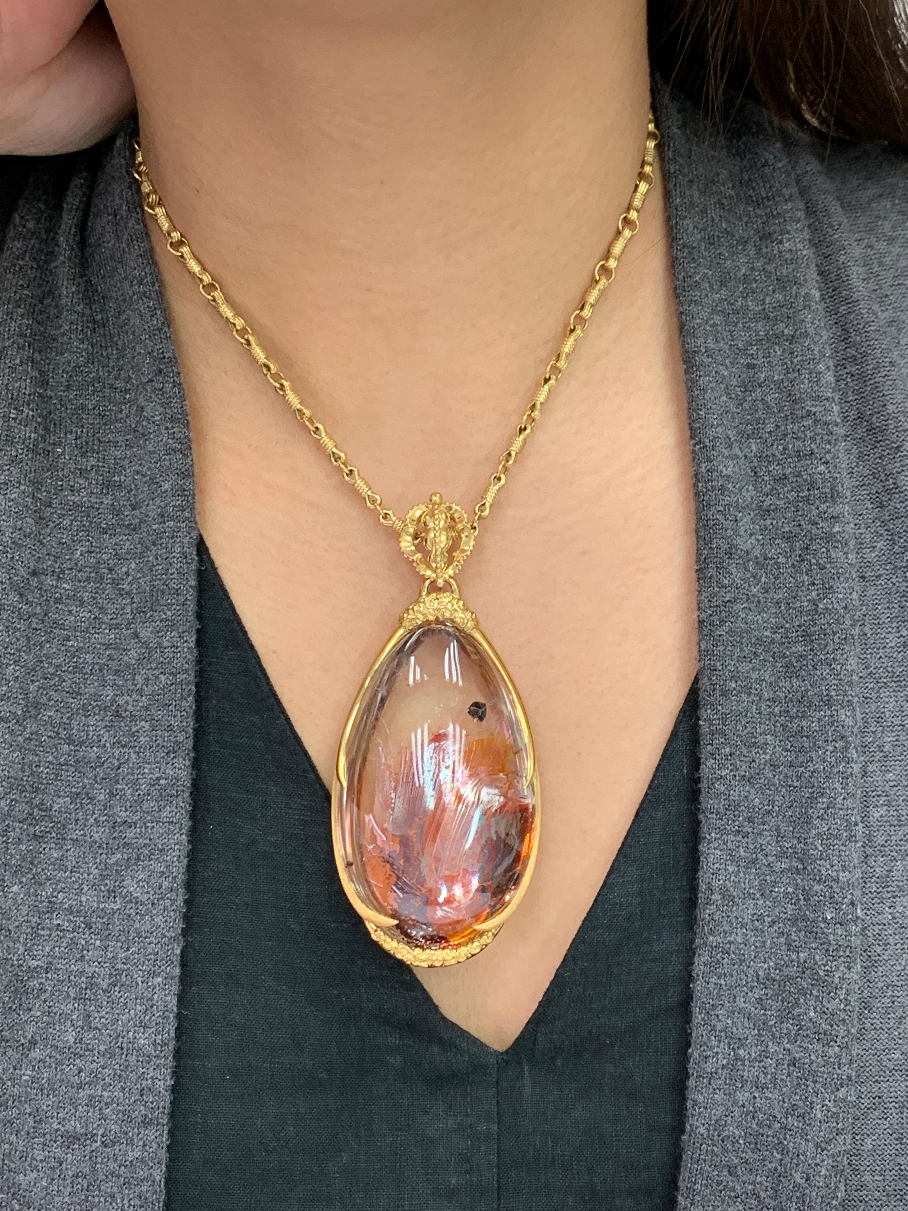 This is not something you see often. This pendant is absolutely a statement piece. It is big, it is substantial and it is impressive. Finding a large piece of natural dendritic quartz crystal this clean and nearly colorless is not easy. Furthermore,