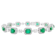 Bracciale Tennis certificato con smeraldi colombiani e diamanti bianchi in oro 18 carati
