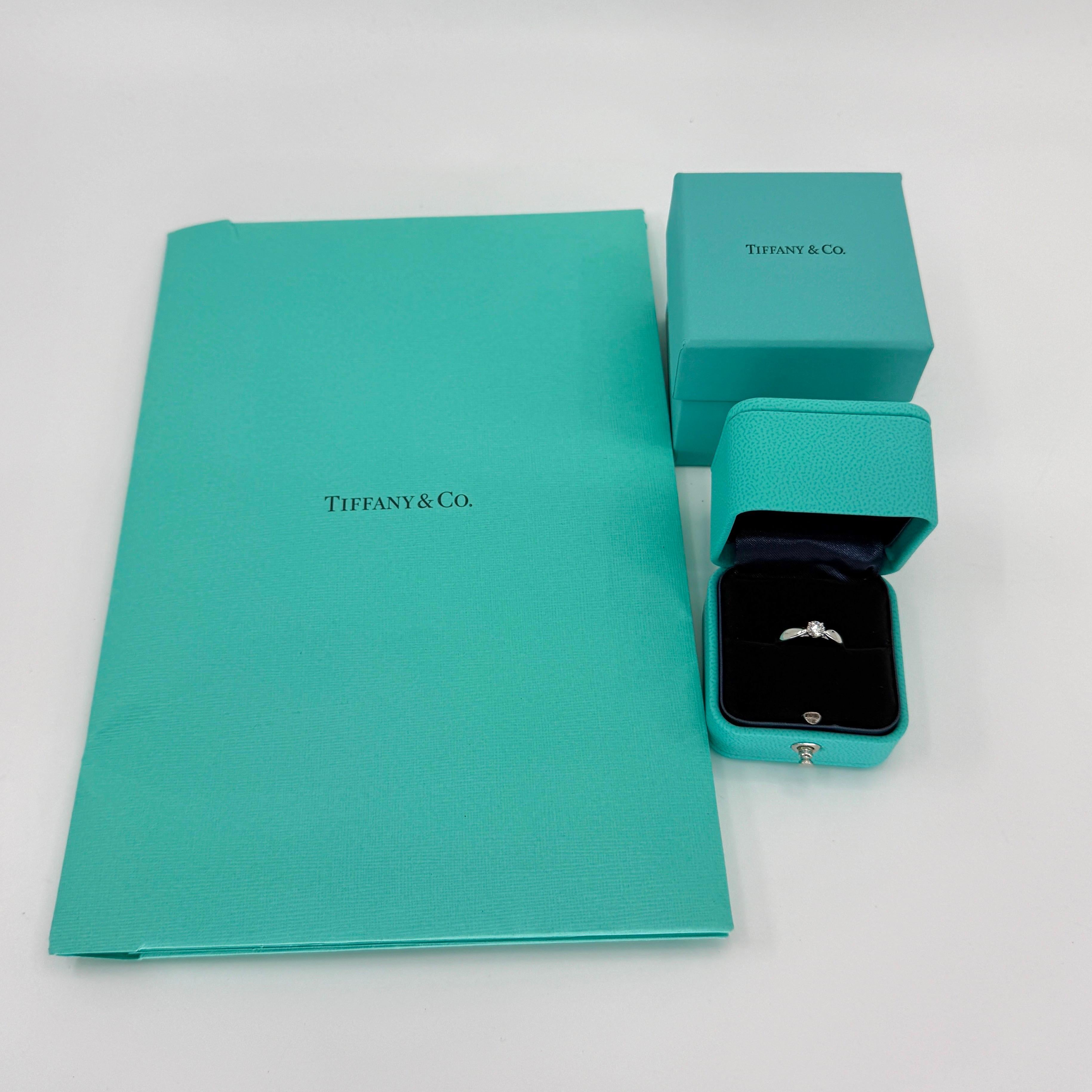 Vintage Tiffany & Co Natural Round Cut Diamond 950 Platinum Solitaire or Engagement Ring With Tiffany Diamond Cert.

Beautiful platinum solitaire ring set with a fine 0.25ct (1/4 Carat) round brilliant cut natural diamond.
The diamond has full