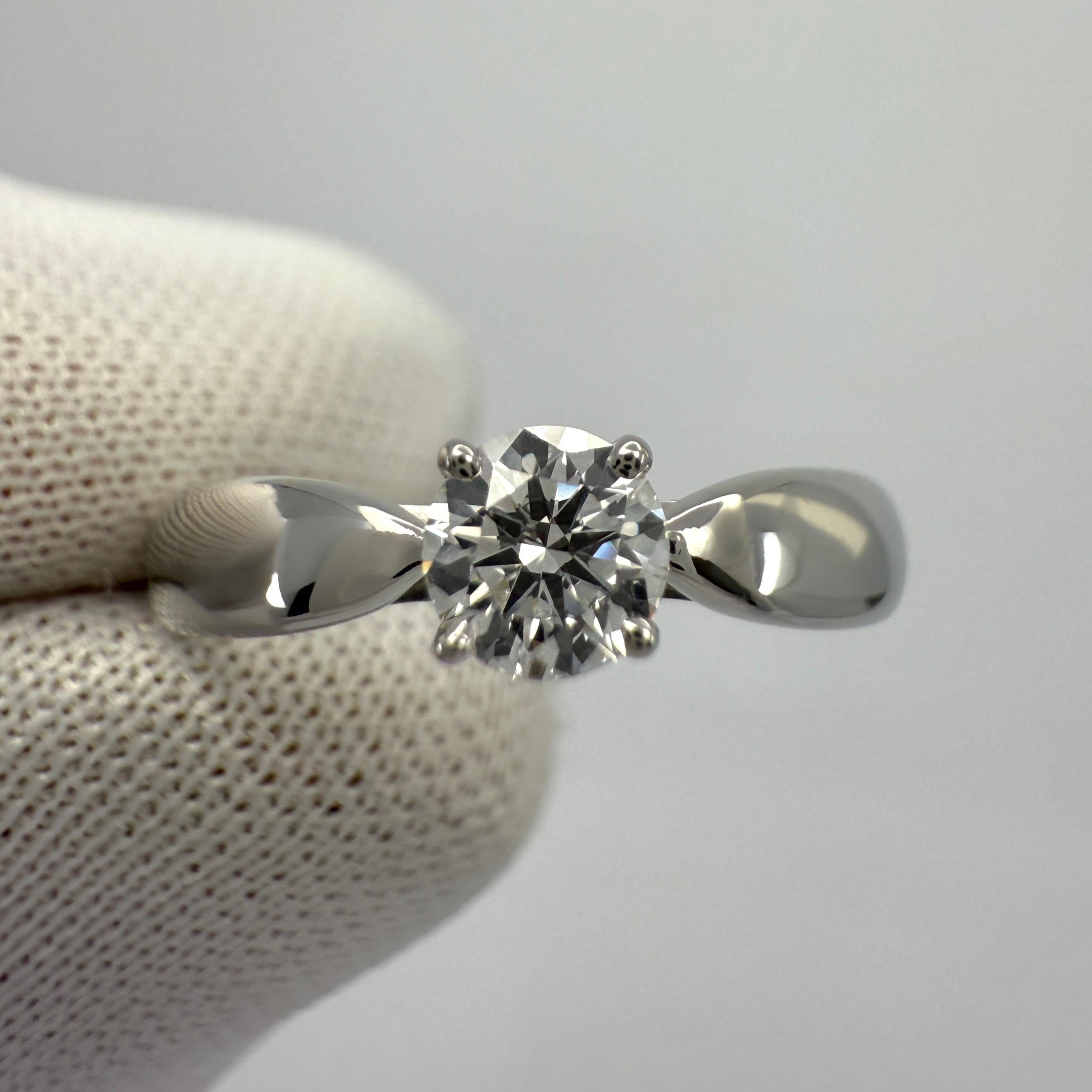 Certified Tiffany & Co Round Cut Diamond 0.25ct H VVS1 Platinum Solitaire Ring In Excellent Condition For Sale In Birmingham, GB