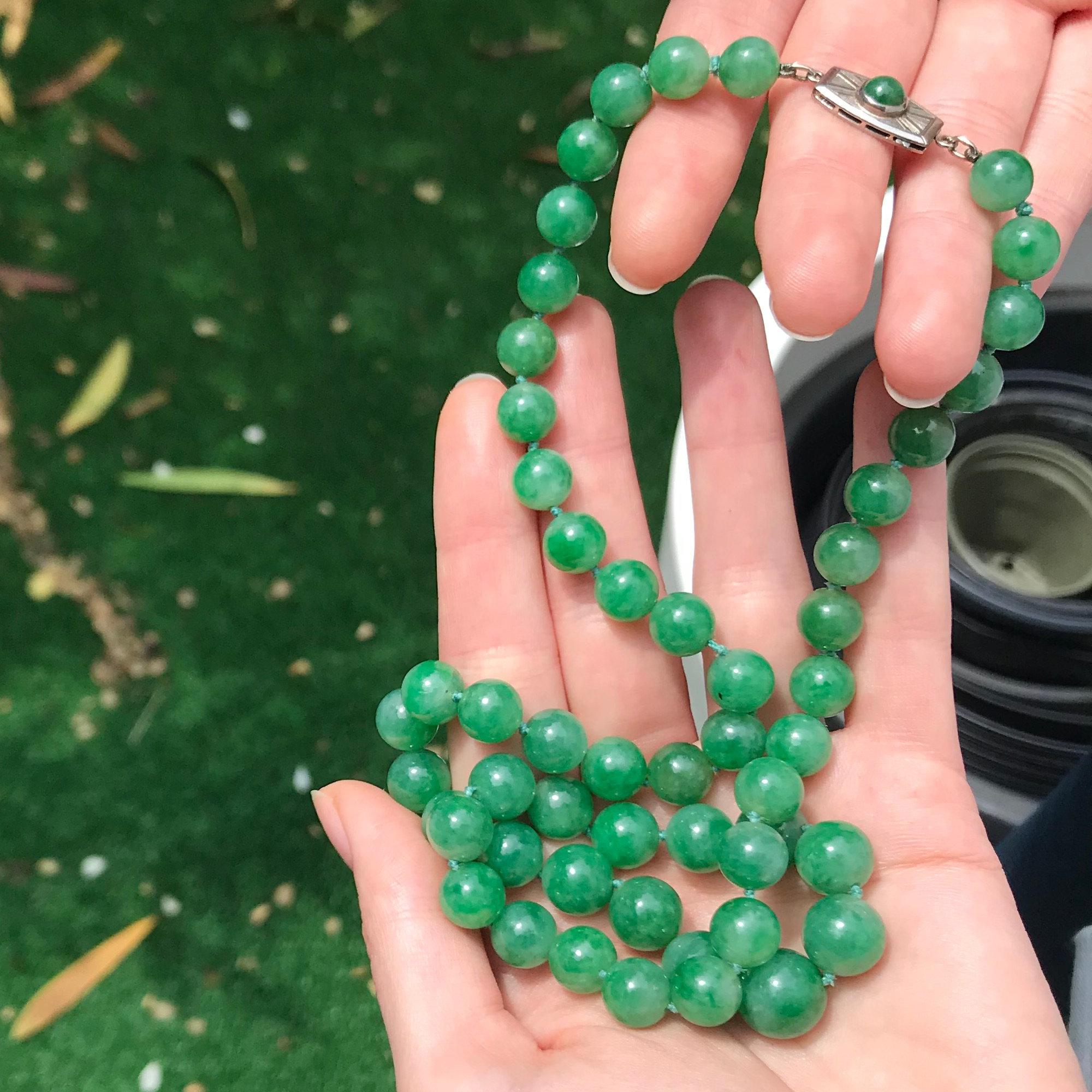 Certified Top Quality Natural A-Jadeite Necklace of 53 beads (67,51 grams) 
A-Jade, translucent, mottled light green and green

Do you wish for a 360° view of this unique jewel?
Just send us your request and we’ll give you the direct link to the