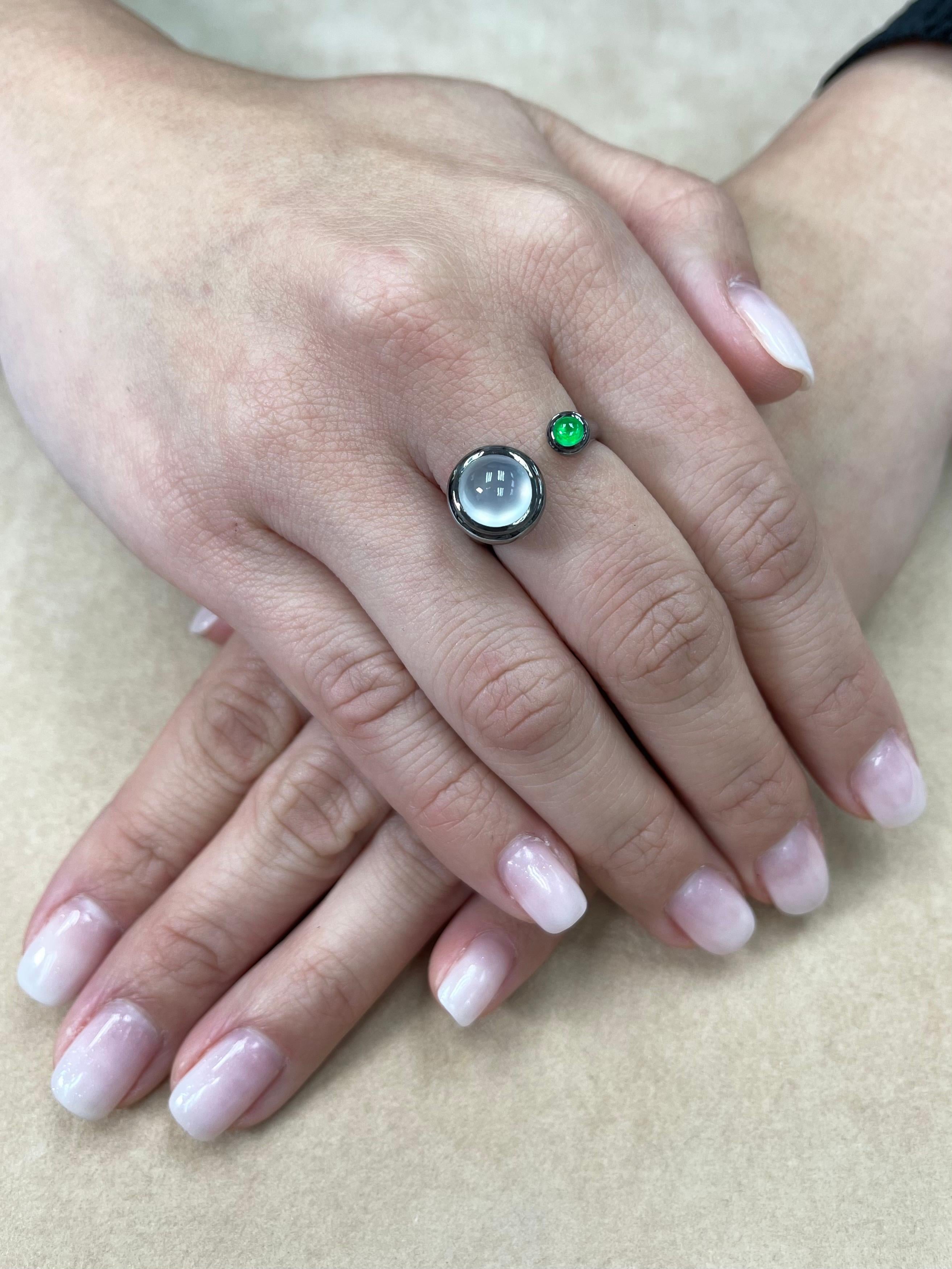 THESE JADE cabochons GLOW! Here is a super modern design, futuristic ICY Jade and diamond ring. The colourless icy jade is paired with a nice icy apple green jade. It is set in solid 18k white gold and then black rhodium plated. It is certified