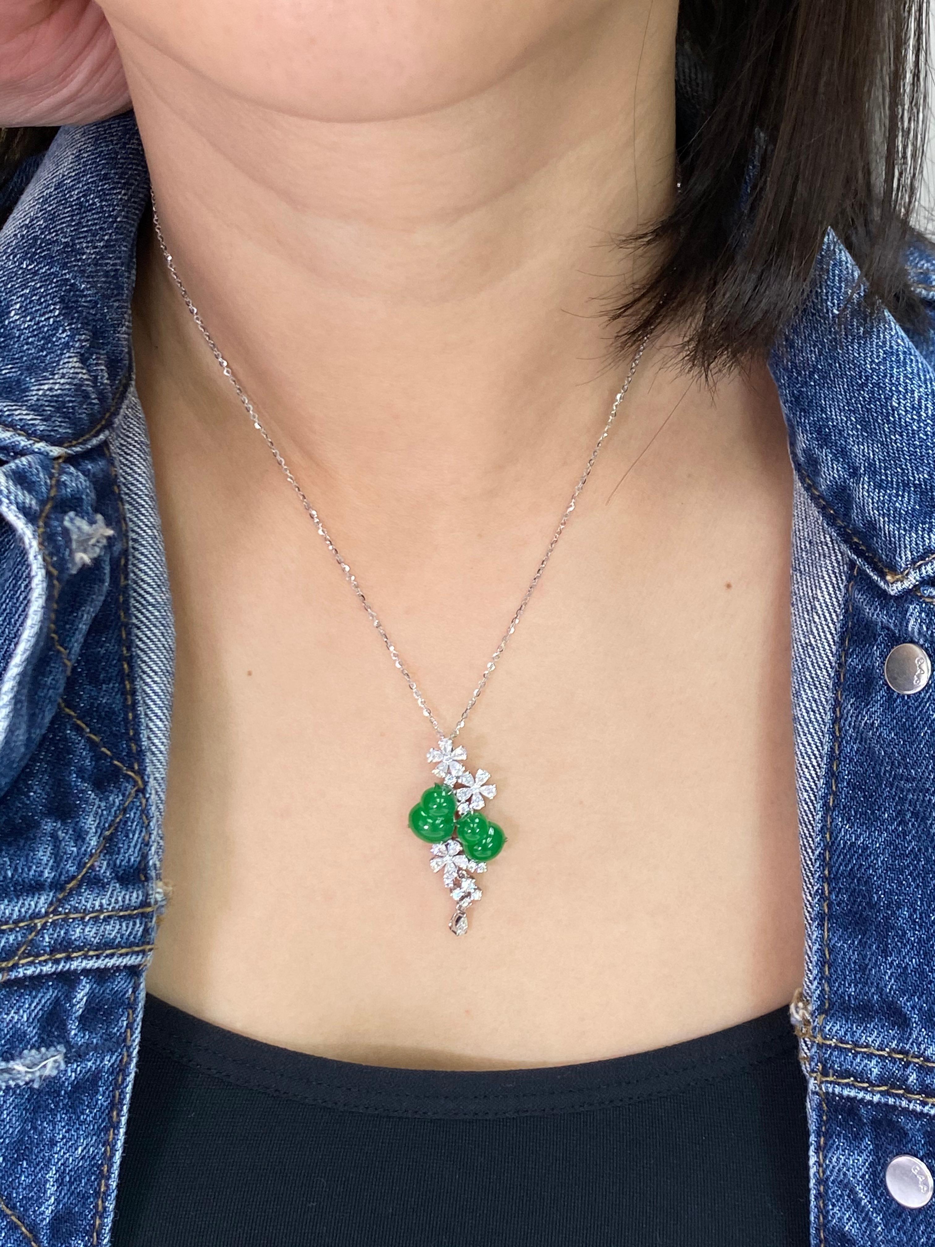 Please check out the HD video! Here is a natural icy Jadeite Jade and diamond pendant with excellent intense apple green color. This color borderline the best imperial green color (we are being very conservative).  It is certified by 2 different