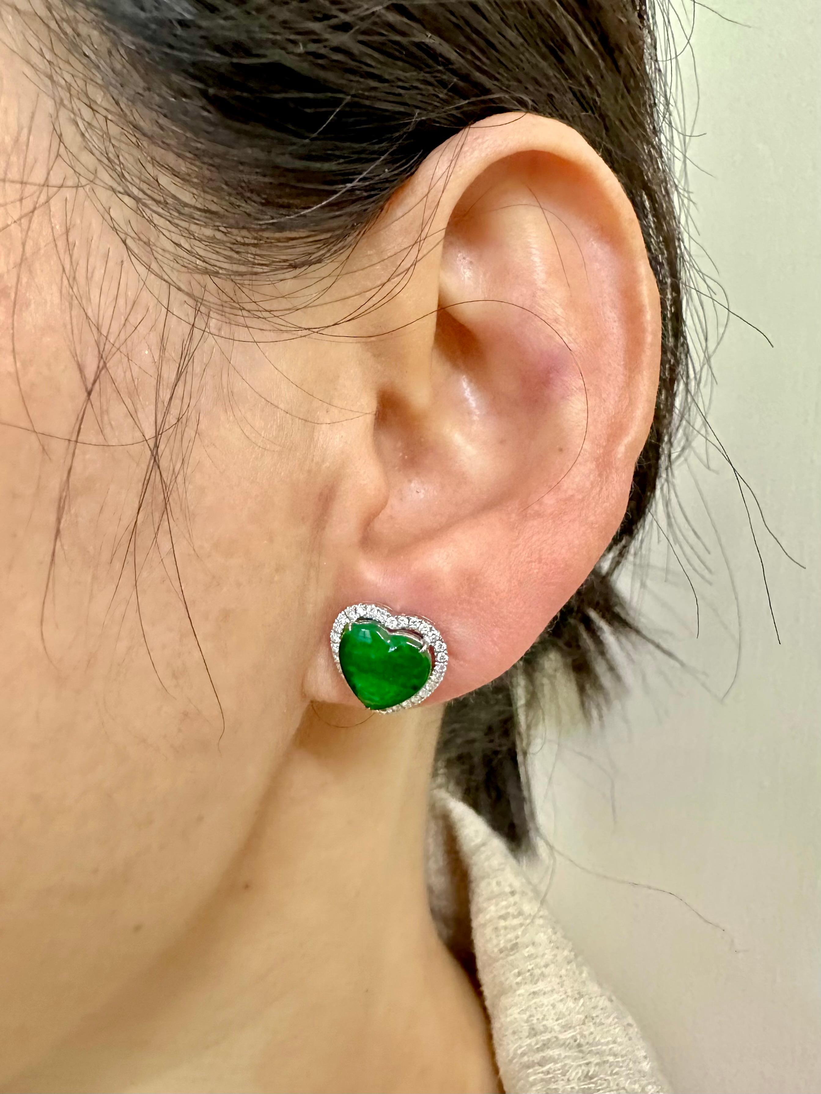 Please check out the HD video! These earrings are out of this world. The natural jade glow under normal light and super glow under sun light or strong light! Here is a nice pair imperial Jade earrings with patches of deep and vivid green. In the