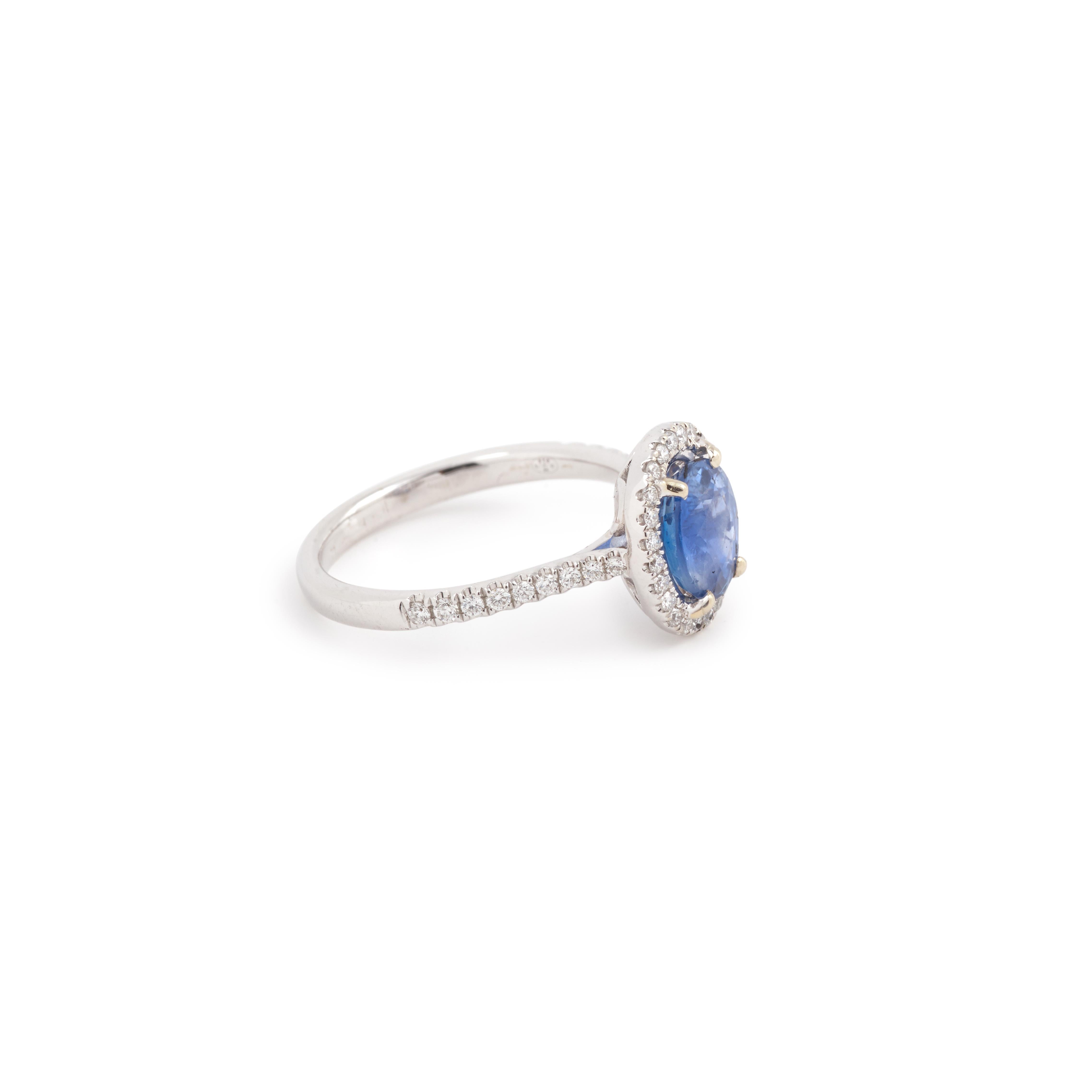 Daisy shape oval Ceylon sapphire diamonds ring, certified by GEM Paris.

Weight: 1.93 carats

Dimensions: 7.69 x 6.98 x 4.35 mm (0.59 x 0.35 x 0.24 inches)

Unheated and untreated (certified).

Set on an 18 carats white gold ring with