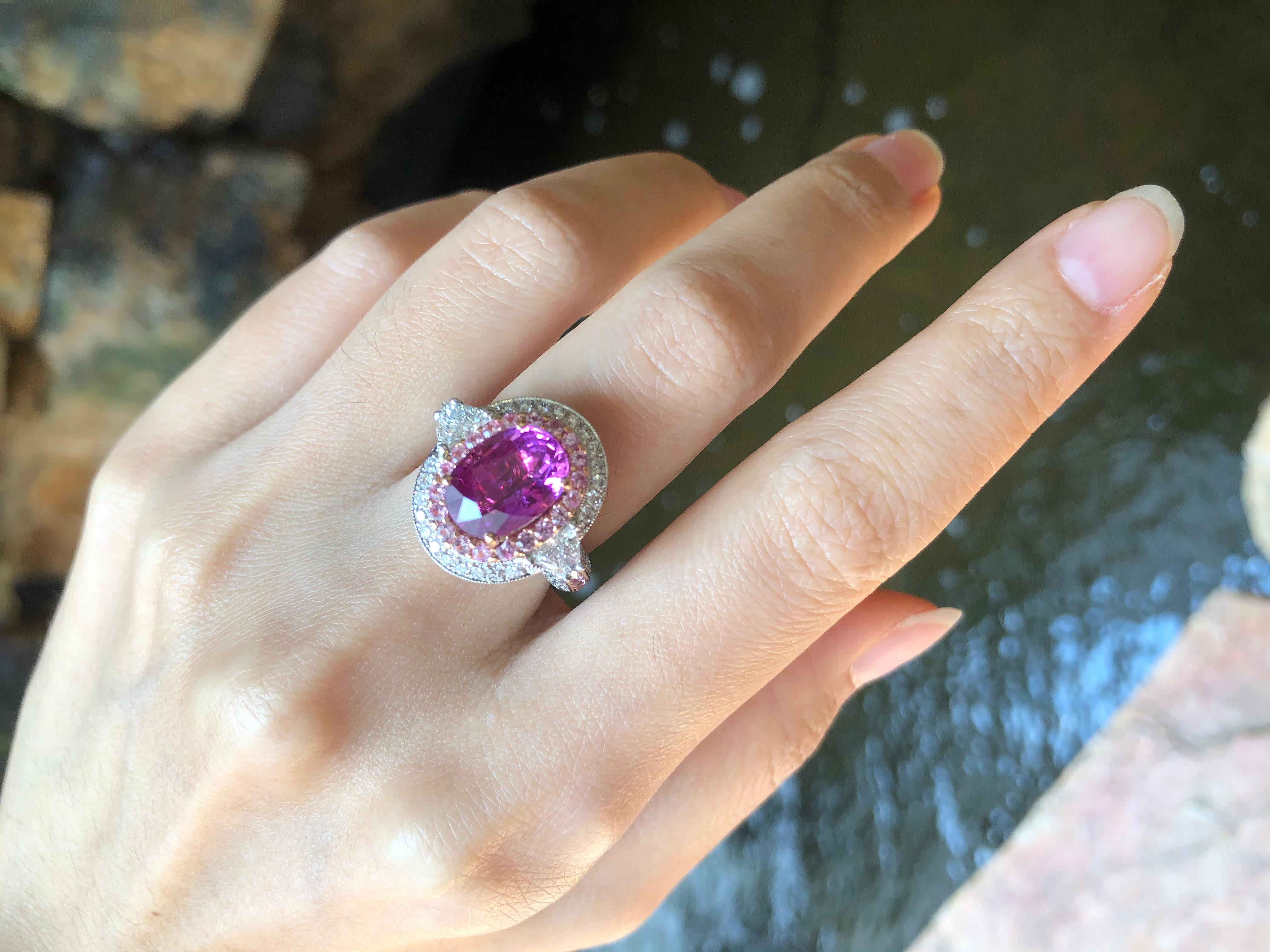 Unheated Pink Sapphire 4.02 carats with Pink Sapphire 0.63 carat and Diamond 1.15 carats Ring set in 18 Karat White Gold Settings
(GIA Certified) 

Width:  1.9 cm 
Length: 1.7 cm
Ring Size: 51
Total Weight: 11.09 grams


