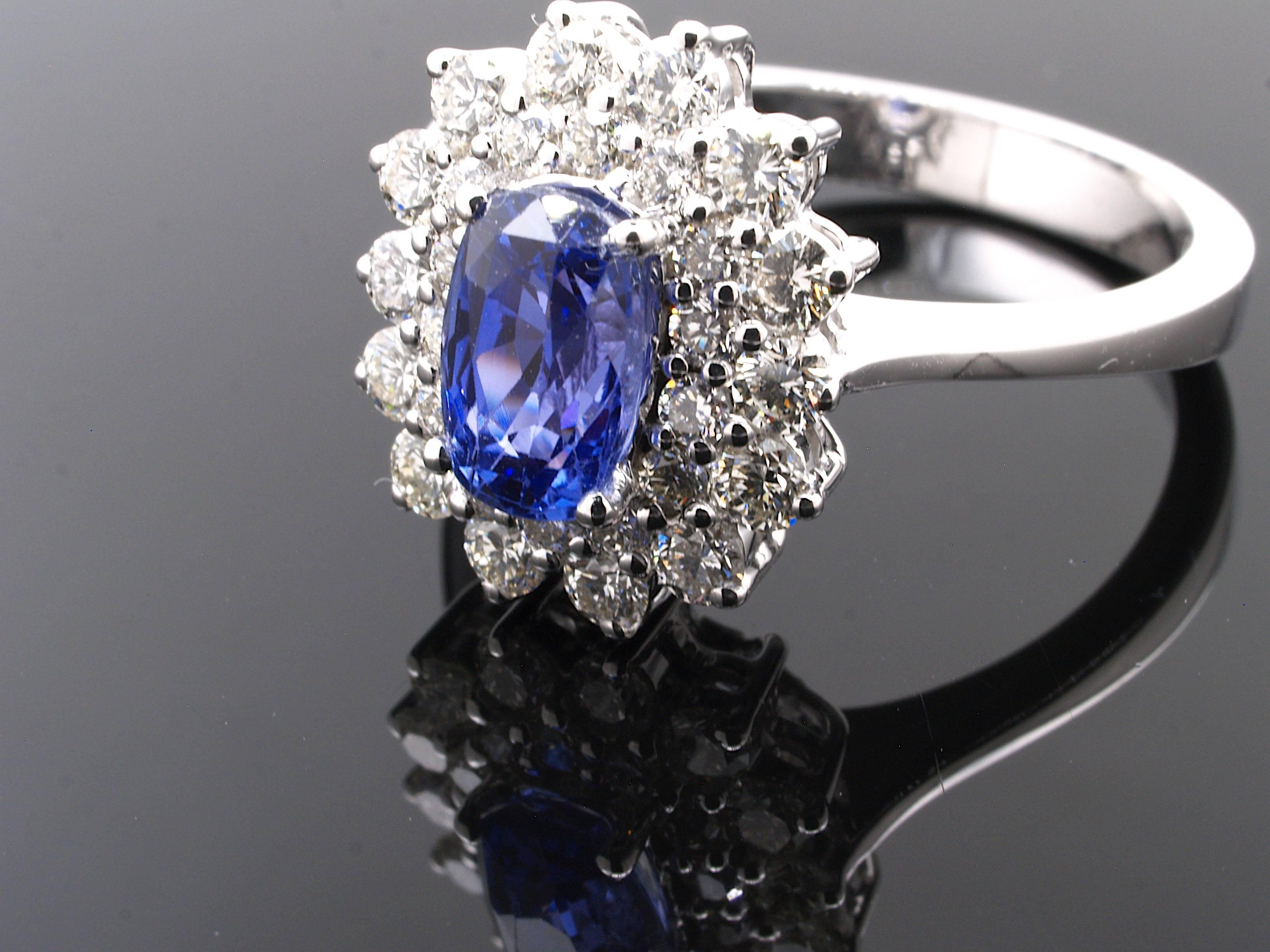              +++++++All realistic offers are welcome.+++++++


This classic ring has a very nice blue Sapphire at its center, surrounded by a sparkling diamond halo. With no indication of thermal enhancement and a IGI certificate to support it, this