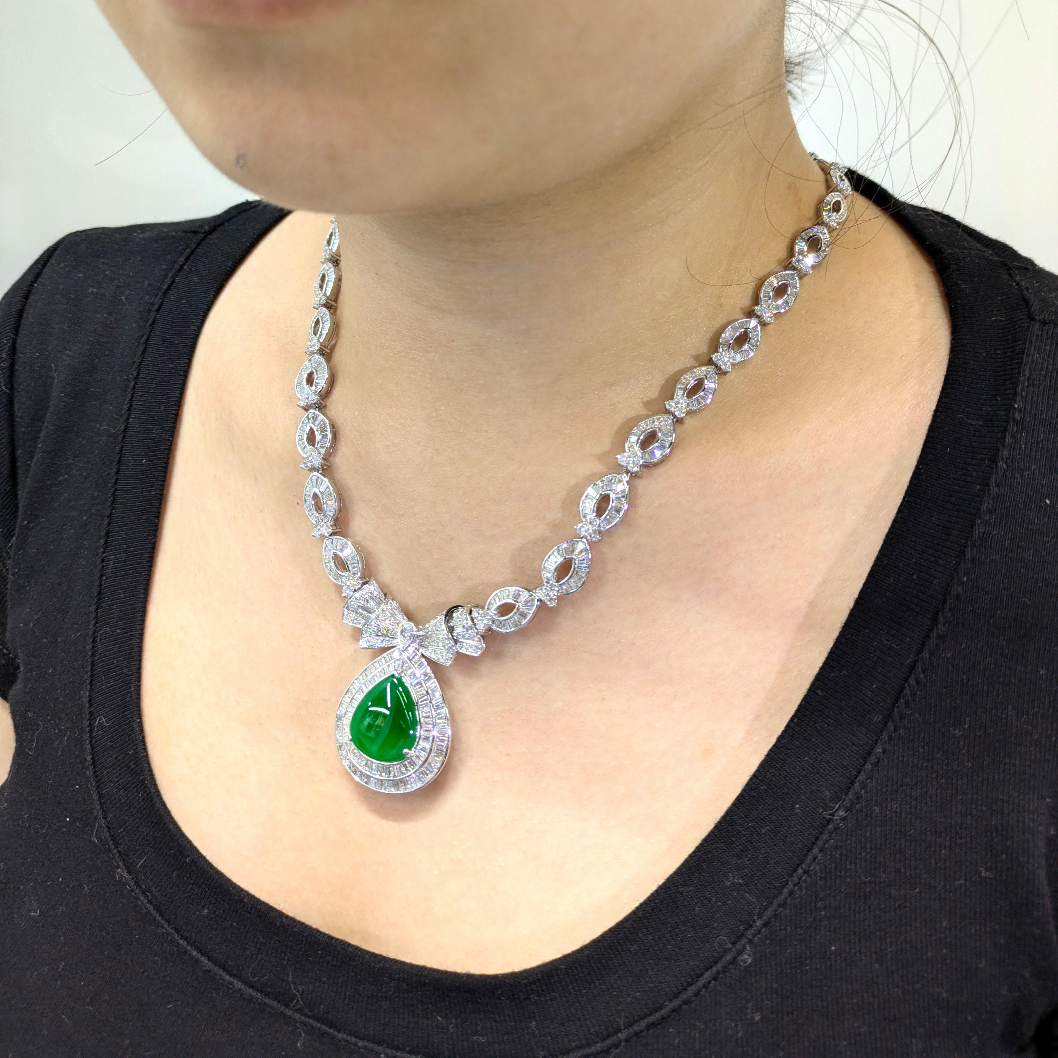 Unveil the unparalleled beauty and exquisite craftsmanship of this certified untreated jadeite and diamond necklace in 18K white gold. This exceptional piece transcends traditional jewelry design, offering a blend of opulence, elegance, and
