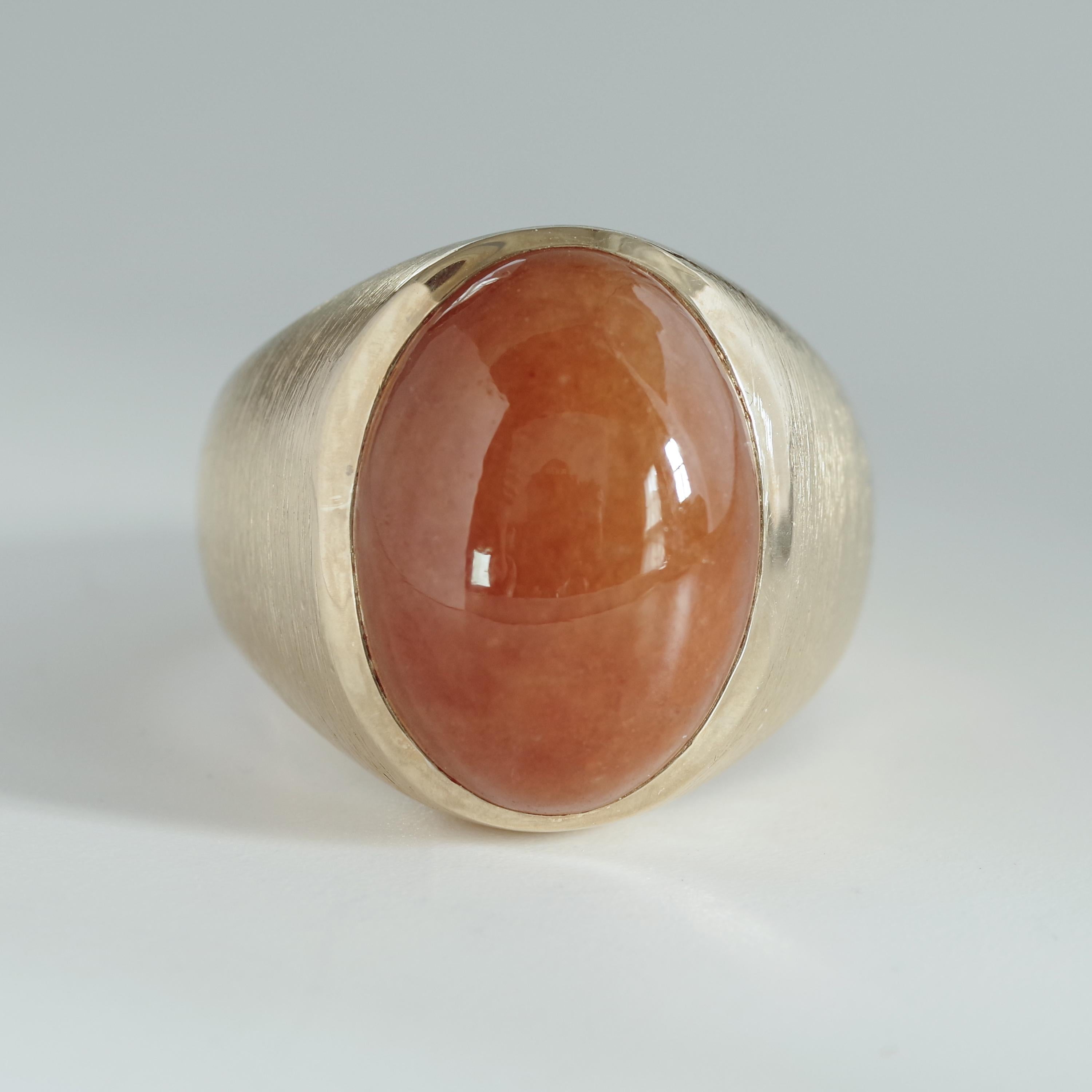 Red jade. It's rare, so you don't come across it often and it's frequently been dyed when you do. I was very excited when I found this 14k yellow gold men's ring from the 1960s featuring a large, saturated and impressive red jade cabochon, certified