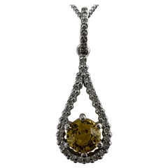 Pendentif en or blanc 18 carats avec saphir jaune vif non traité et diamant certifié