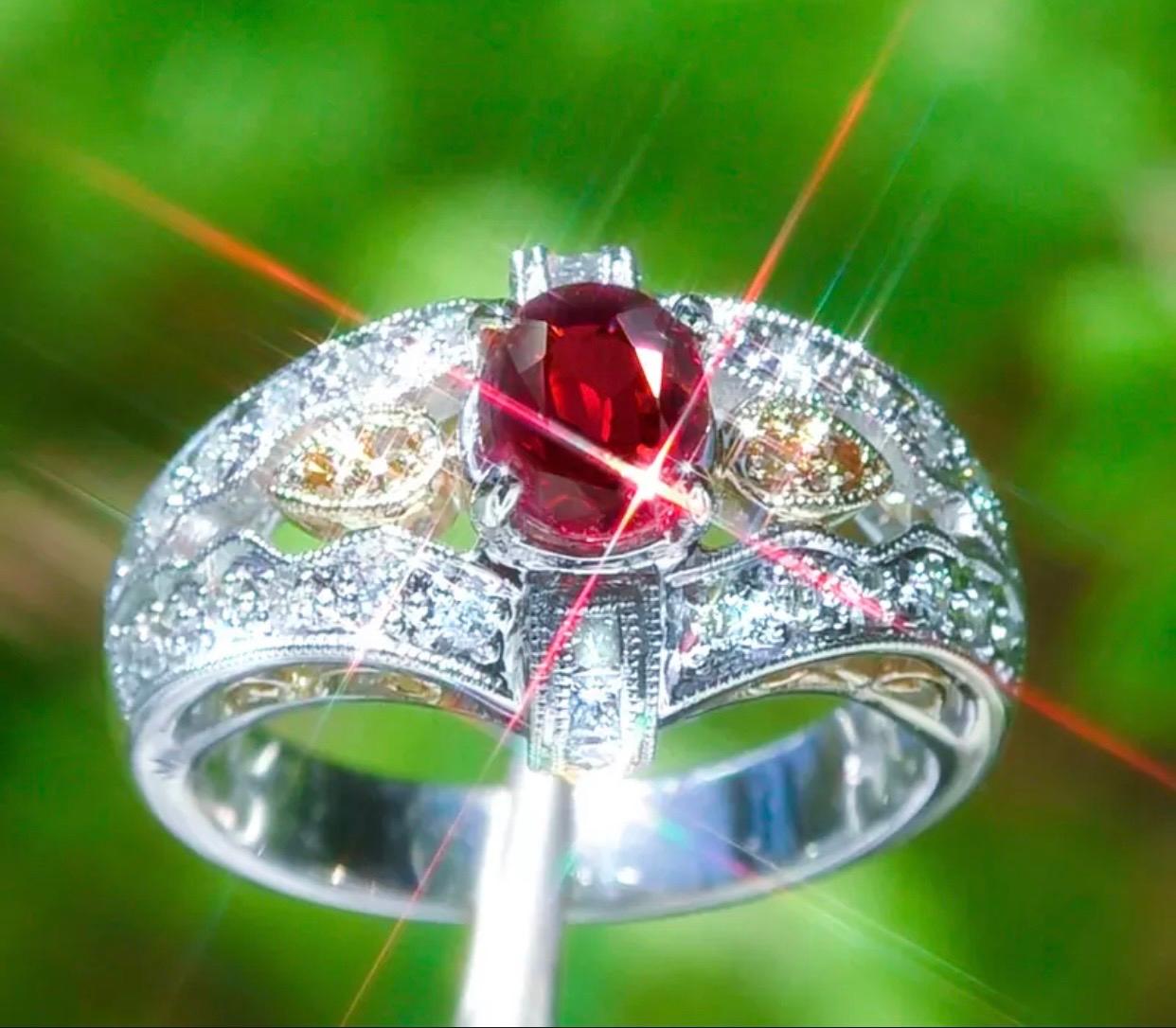 Certified & Appraised by
American International Gemological Laboratories

This Burma Ruby is Beyond Rare!
Ring Size: US 6.5 (Free sizing available)
Natural Ruby: 1.56ct
Cut: Oval   Type: Transparent
Color: Red (HIGHLY Sought After)  
Treatment: