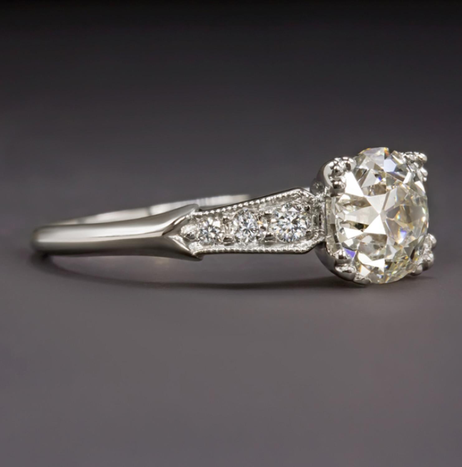 Elegant and full of brilliant sparkle, this vintage engagement ring’s classic design is crowned by a stunning 1.31ct old European cut certified diamond. The high quality diamond is beautifully white and exceptionally clean with H color and VS2