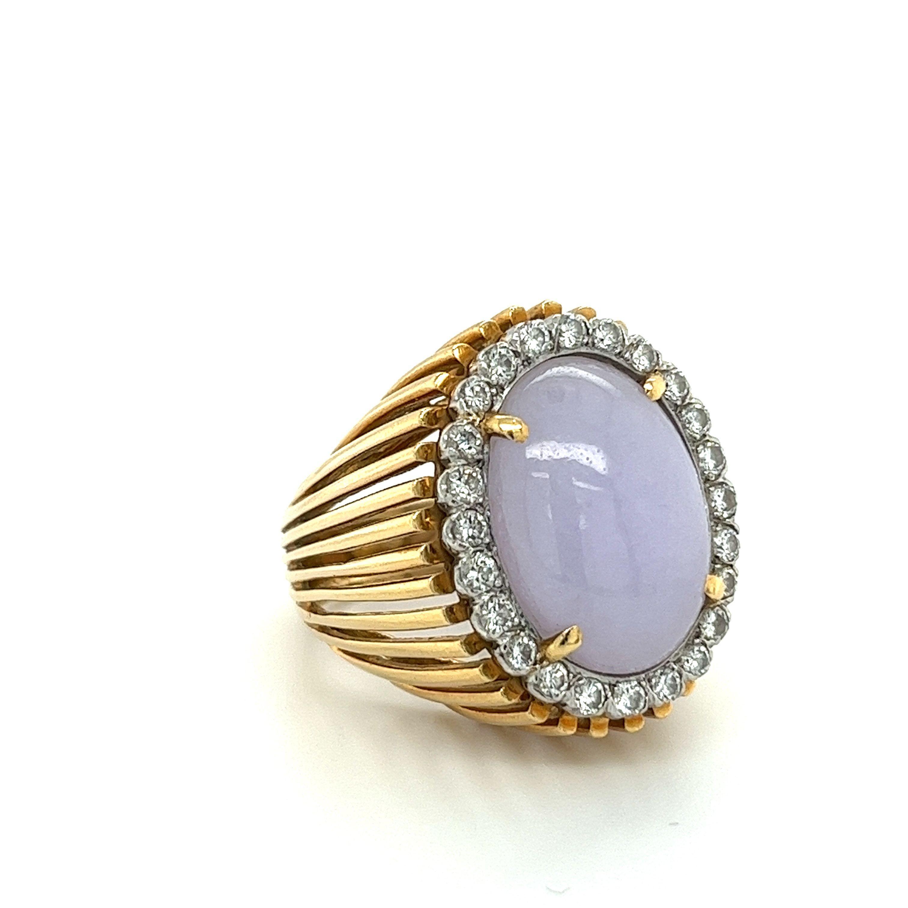 Experience the timeless sophistication of this stunning lavender jade ring. The oval shape cabochon cut jade has been certified as a Type A natural jade by Mason Kay, a respected authority on the gemstone. This rare and high-quality jade has not