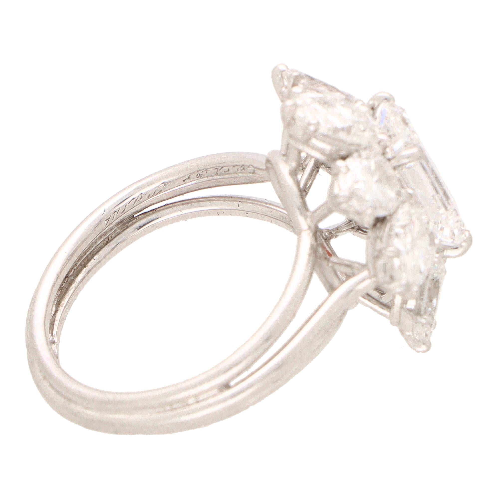 Certified Vintage Cartier D-Colour Emerald Cut Cluster Ring in Platinum In Excellent Condition For Sale In London, GB