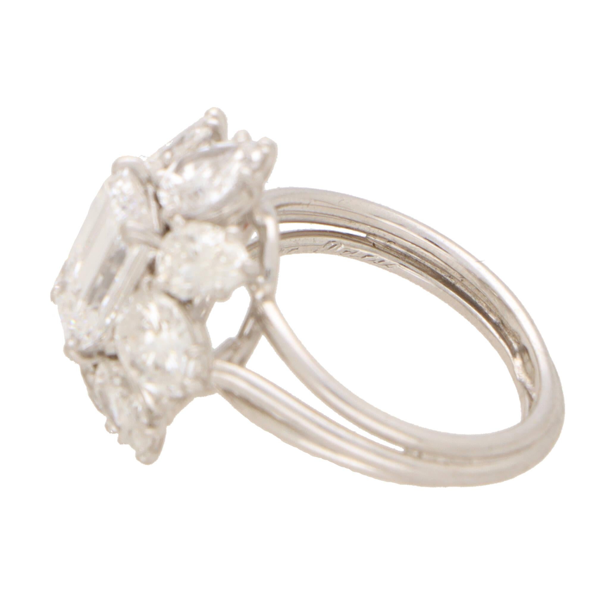 Women's or Men's Certified Vintage Cartier D-Colour Emerald Cut Cluster Ring in Platinum For Sale