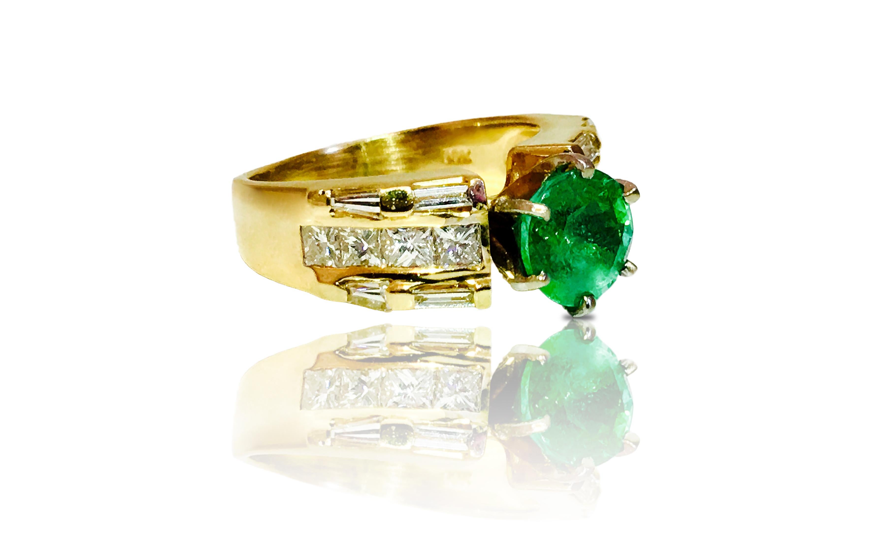 Metal: 14K Yellow gold. 
3.10 carat emerald, round cut. 100% natural earth mined. 
1.75 carat diamonds. VS clarity and G color. Baguette and princess cut diamonds. 

Total Carat weight of all precious stones: 4.85 carats. 
All precious stones are