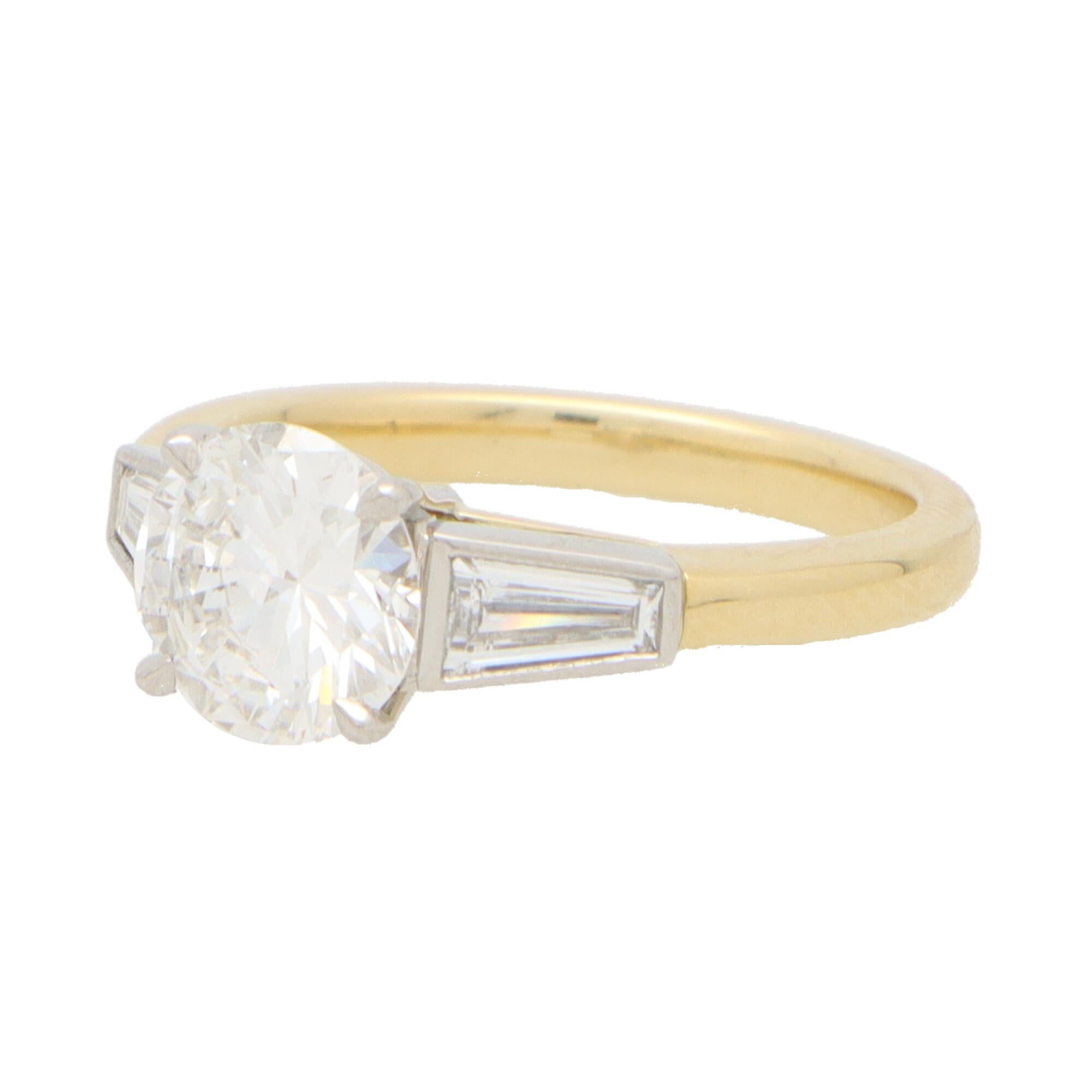 classic winston pear-shaped engagement ring with tapered baguette side stones