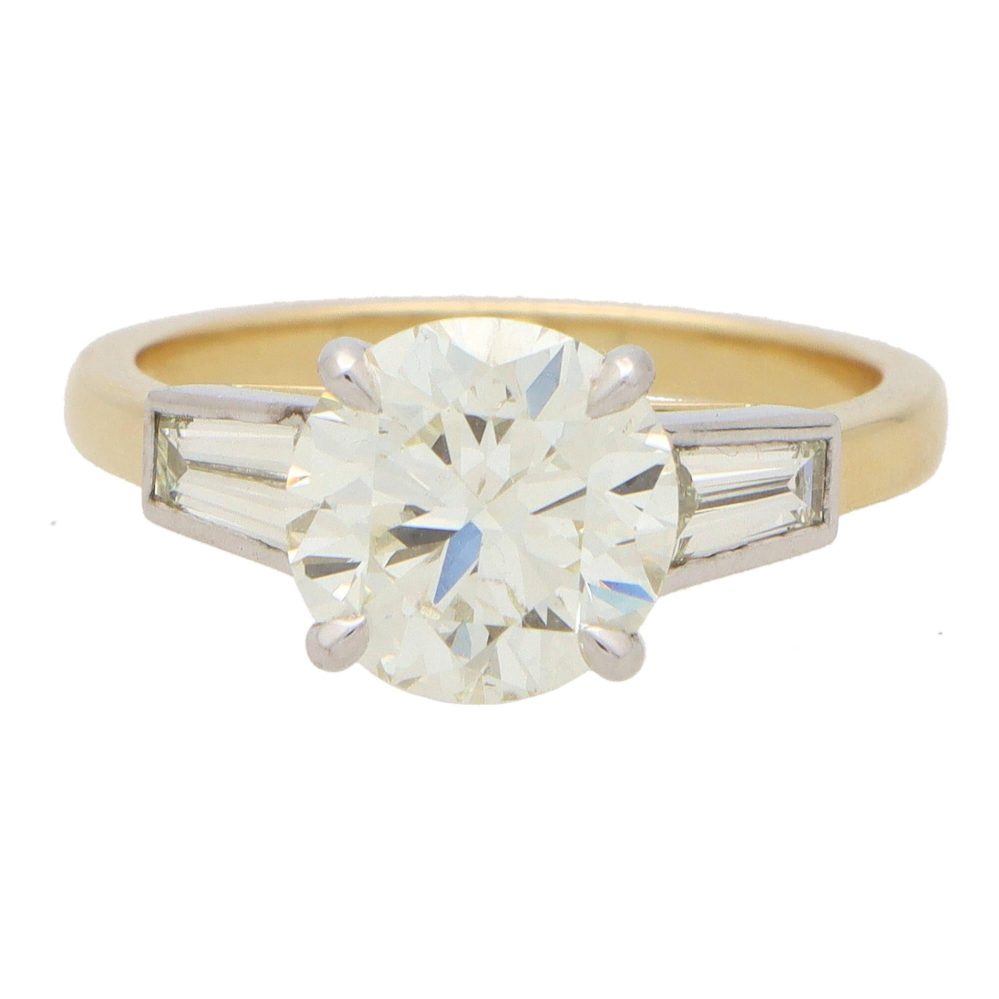 Modern Certified Vintage Round and Tapered Baguette Ring in Yellow Gold and Platinum For Sale
