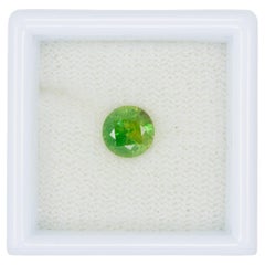 Certified vivd green faceted demantoid garnet, 1.15 ct