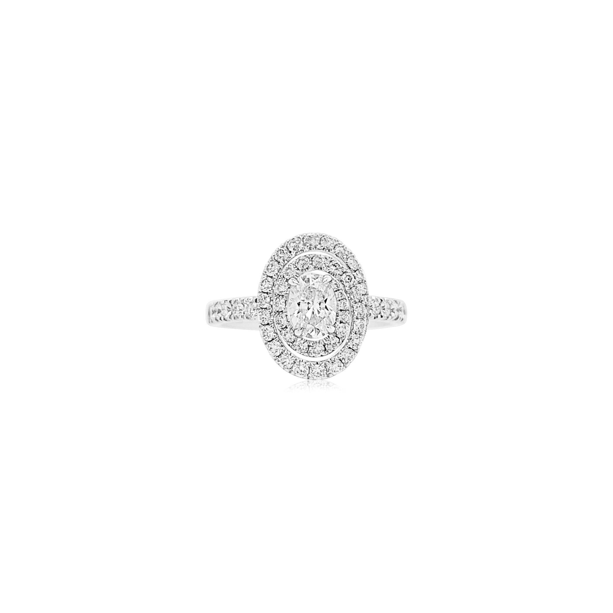The design of this ring is special and brings out the beauty of the Certified center White diamond, with the careful placement of round brilliant cut white diamonds in a spiral design, all set in Platinum

Oval Shape White diamonds: 0.52 cts (CGL