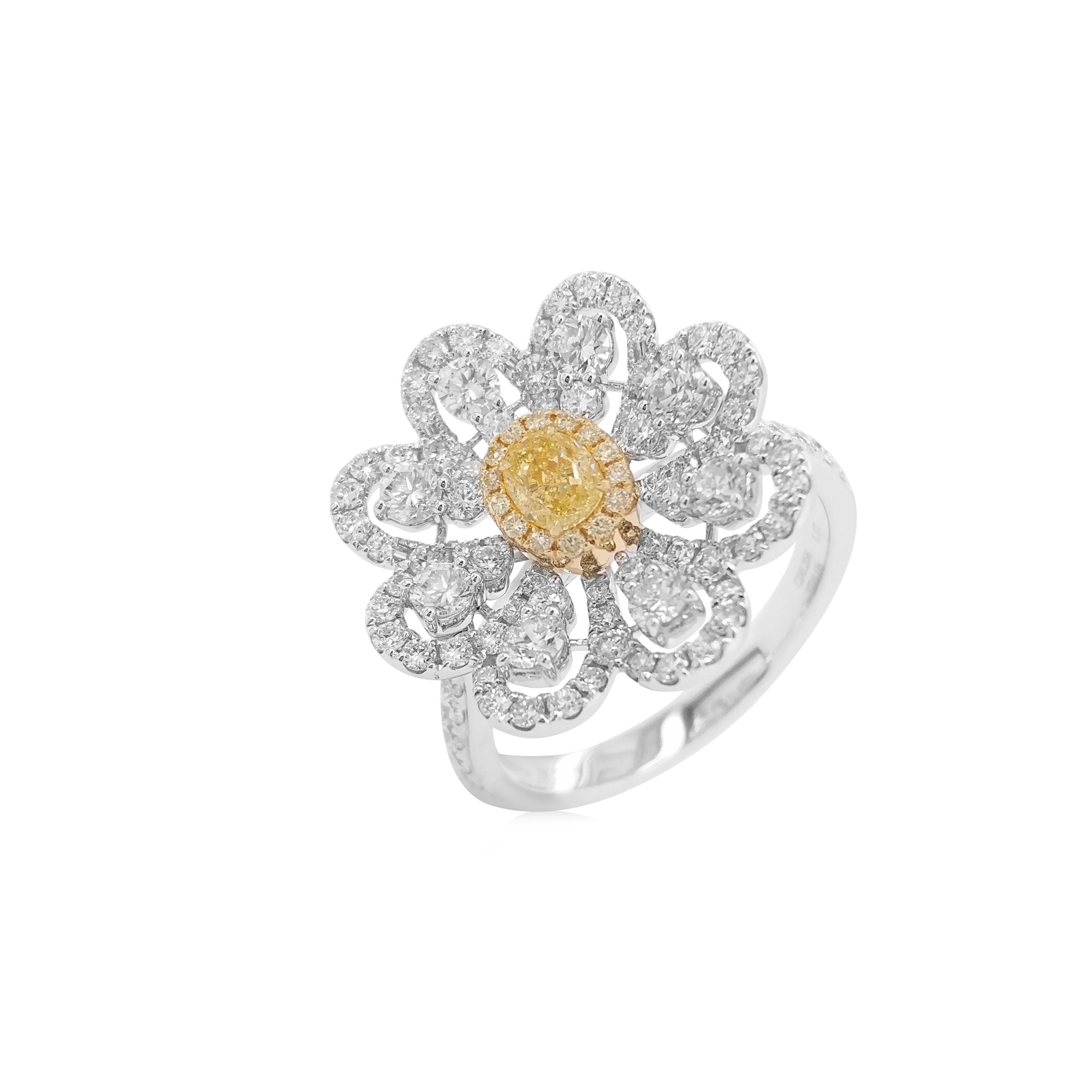 Natural Yellow Diamond Studded Ring with Round Brilliant cut white diamonds creating a flower-like design is a beautiful addition to your jewelry collection.
-	Natural Fancy Yellow diamond, 0.256 carats (CGL, Japan Certified)
-	Round Brilliant Cut