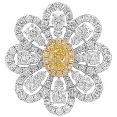 Anello in oro giallo e bianco certificato con diamante floreale K18