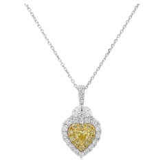 Pendentif en forme de cœur en diamant jaune et blanc certifié avec chaîne en platine