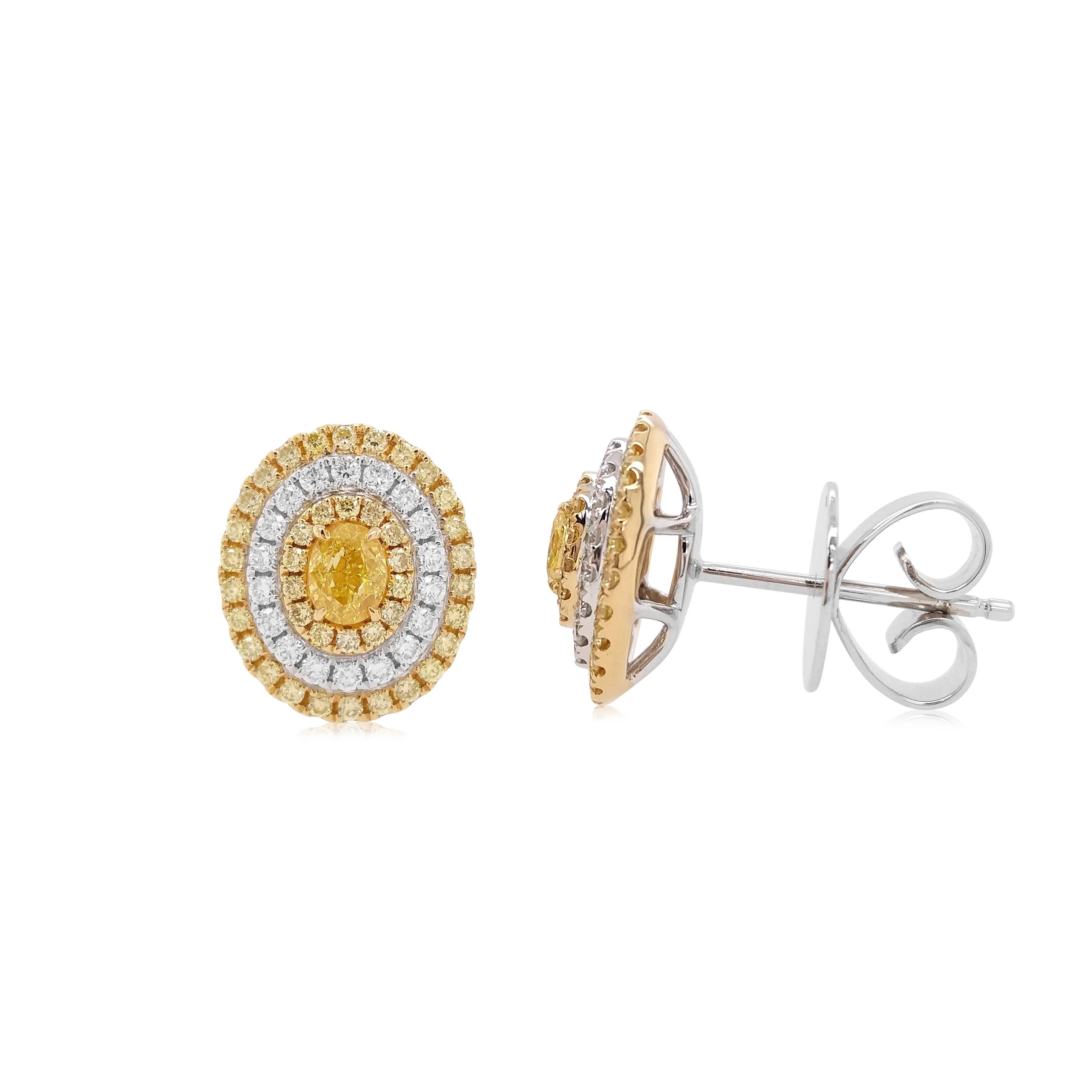 These intricate earrings feature lustrous oval-shaped Yellow diamonds with halos of sparkling yellow and white diamonds. Bold and striking, these earrings will add a touch of sophistication whenever they are worn. The perfect gift for a loved one,