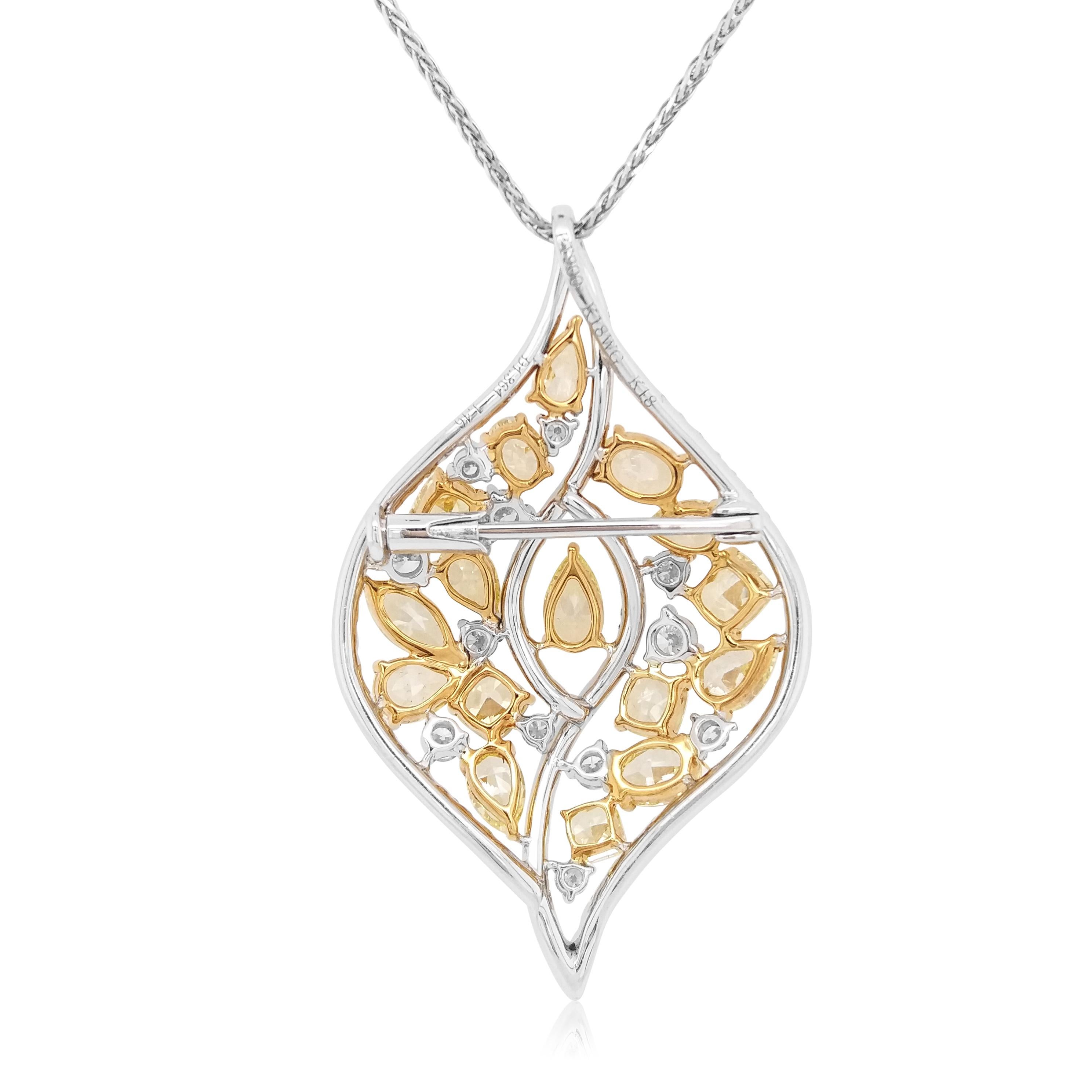 This exclusive brooch-pendant necklace 2-way features 16pcs certified luscious Yellow diamonds at the forefront of the design, framed by a delicate pattern of glittering white diamonds. Bold and striking, this unique pendant-brooch is the perfect