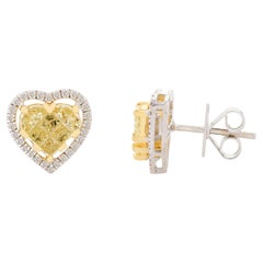 Coppia di orecchini a cuore con diamanti gialli certificati per donna in oro bianco 18 carati