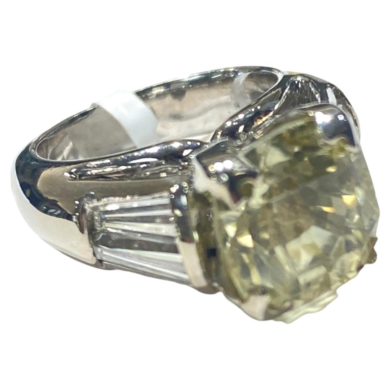 Beautiful, engagement ring features a cushion-cut yellow sapphire. The sapphire is a certified EGL natural gemstone from. Diamonds are very long and hard to find, this size.
  The ring shank graduates from a 7 mm to a 4.30 mm at the bottom and the