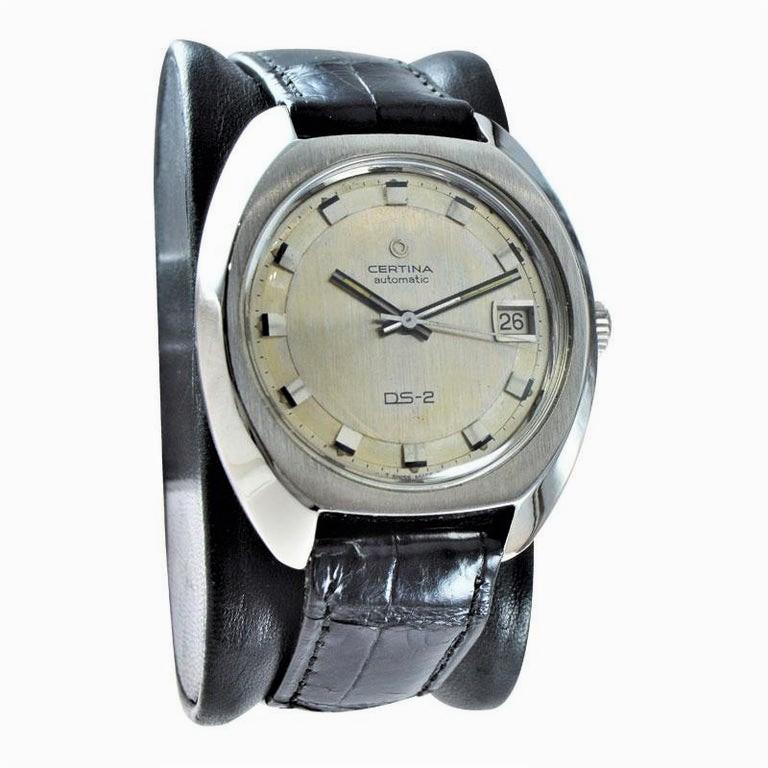 FACTORY / HOUSE: Certina Watch Company
STYLE / REFERENCE: Moderne Style / DS 2
METAL / MATERIAL: Stainless Steel 
CIRCA: 1970's
DIMENSIONS: Length 43mm X Width 39mm
MOVEMENT / CALIBER: Automatic Winding / 28 Jewels / 25-651
DIAL / HANDS: Original