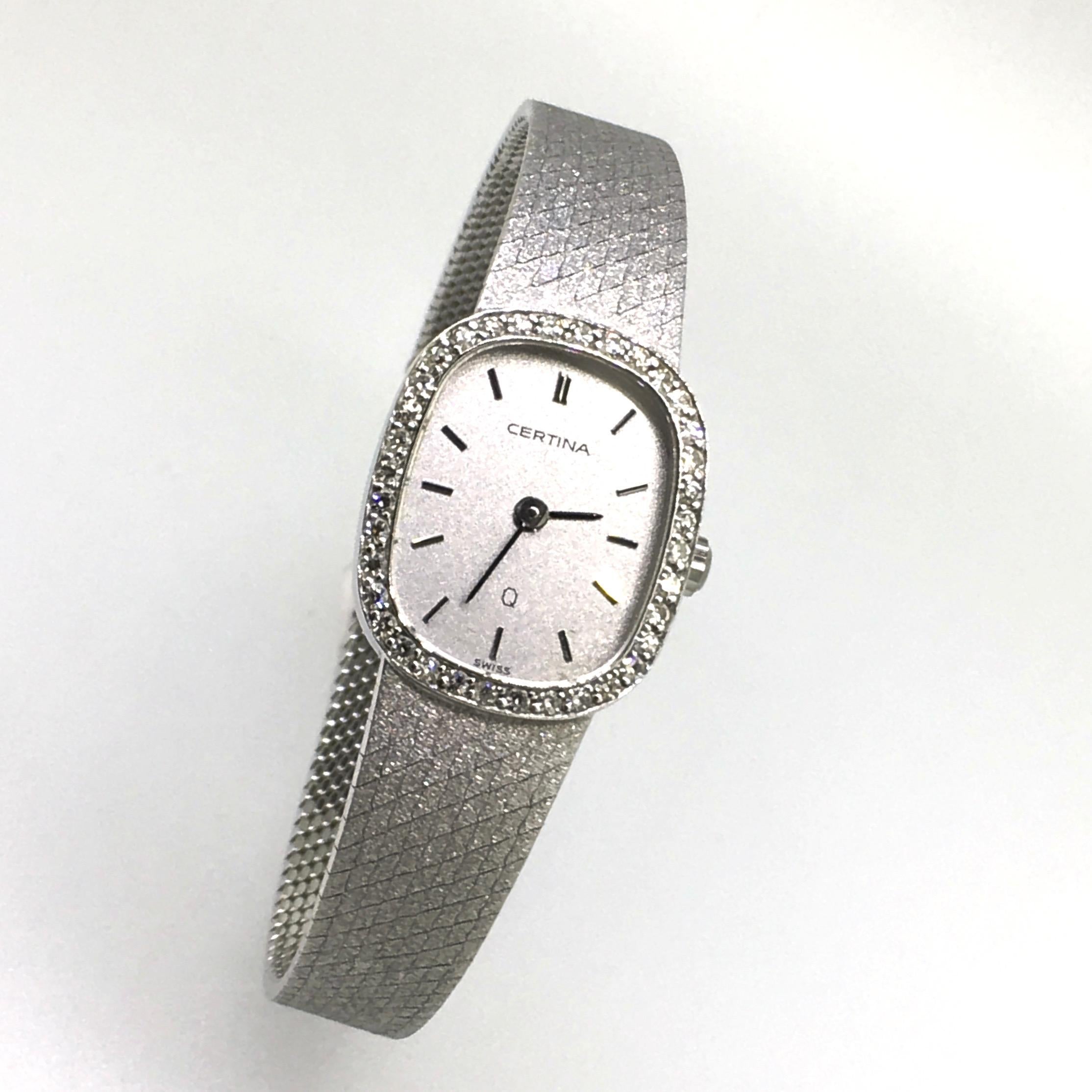certina 18k gold watch
