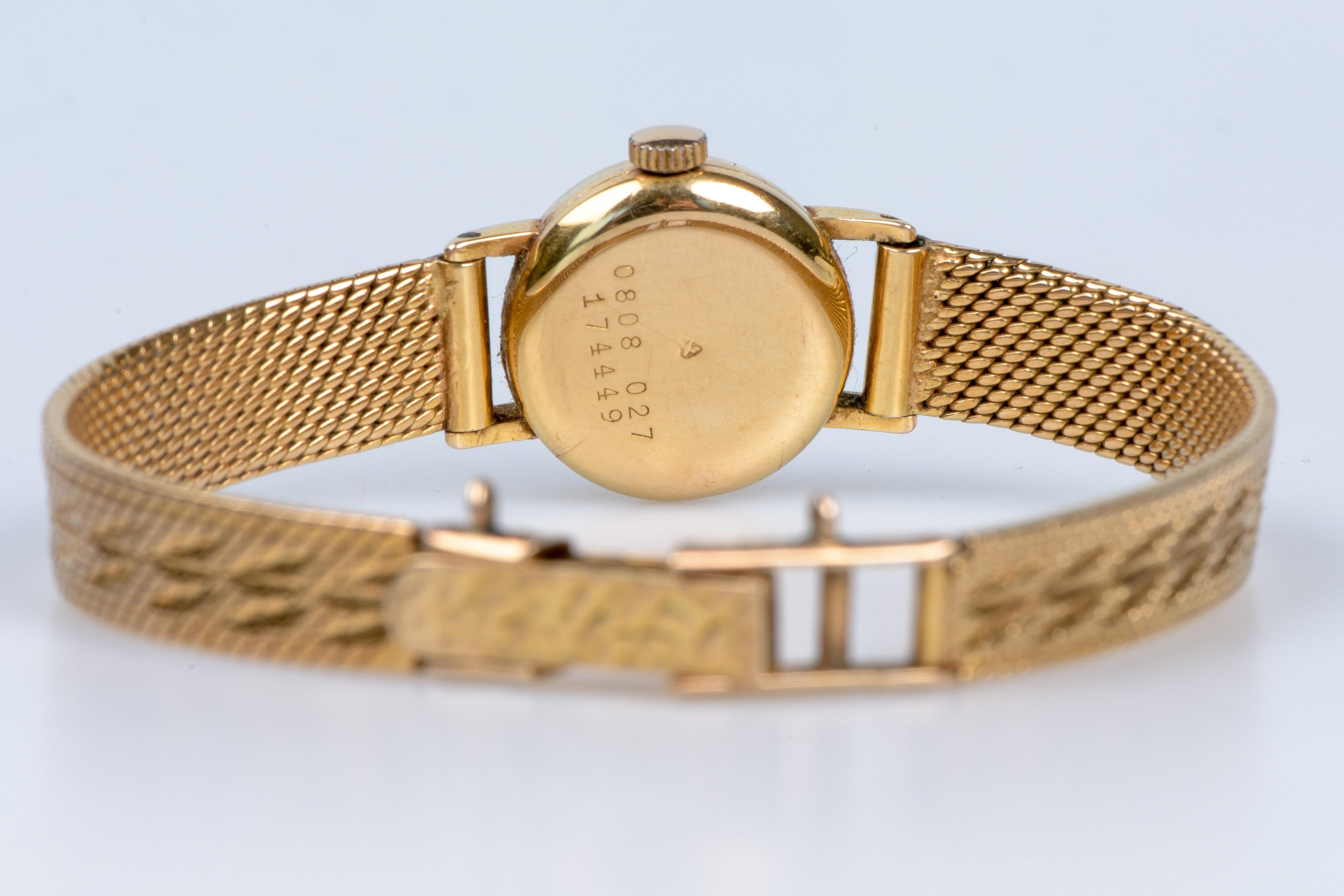 CERTINA's watch in 18carats yellow gold with a soft decorated fine mesh bracelet 7