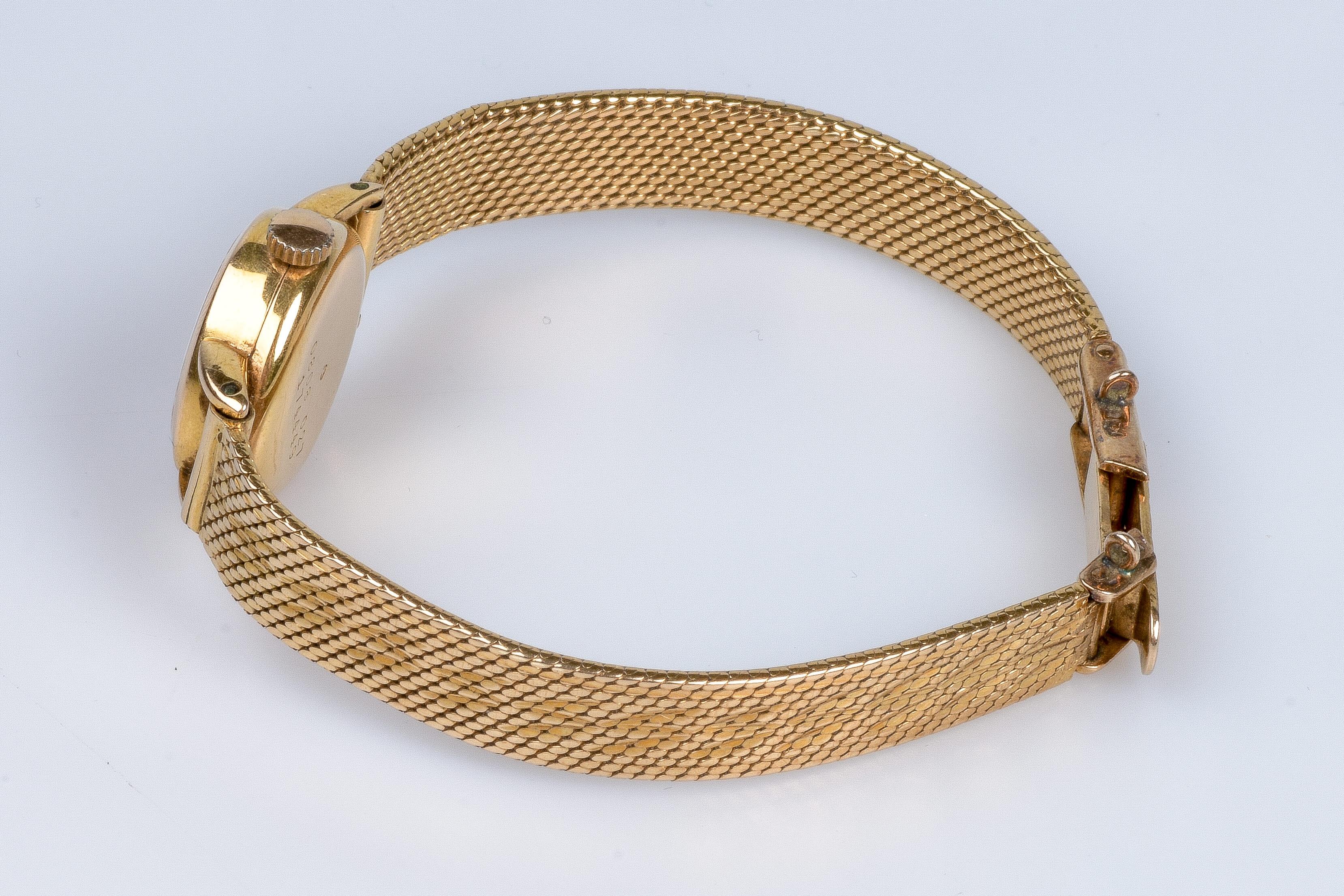 CERTINA's watch in 18carats yellow gold with a soft decorated fine mesh bracelet 8