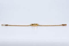 CERTINA's watch in 18carats yellow gold with a soft decorated fine mesh bracelet
