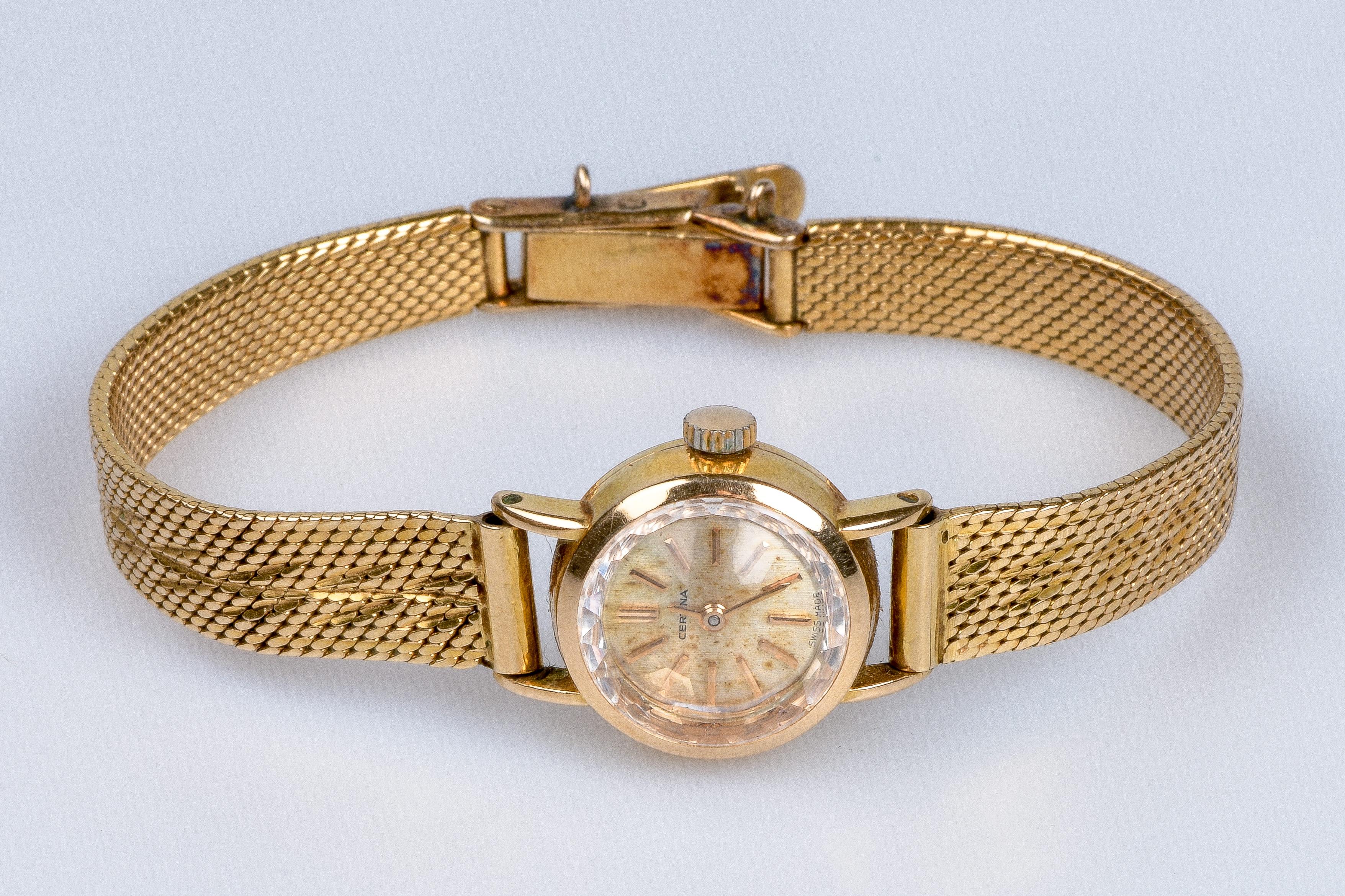 Women's CERTINA's watch in 18carats yellow gold with a soft decorated fine mesh bracelet