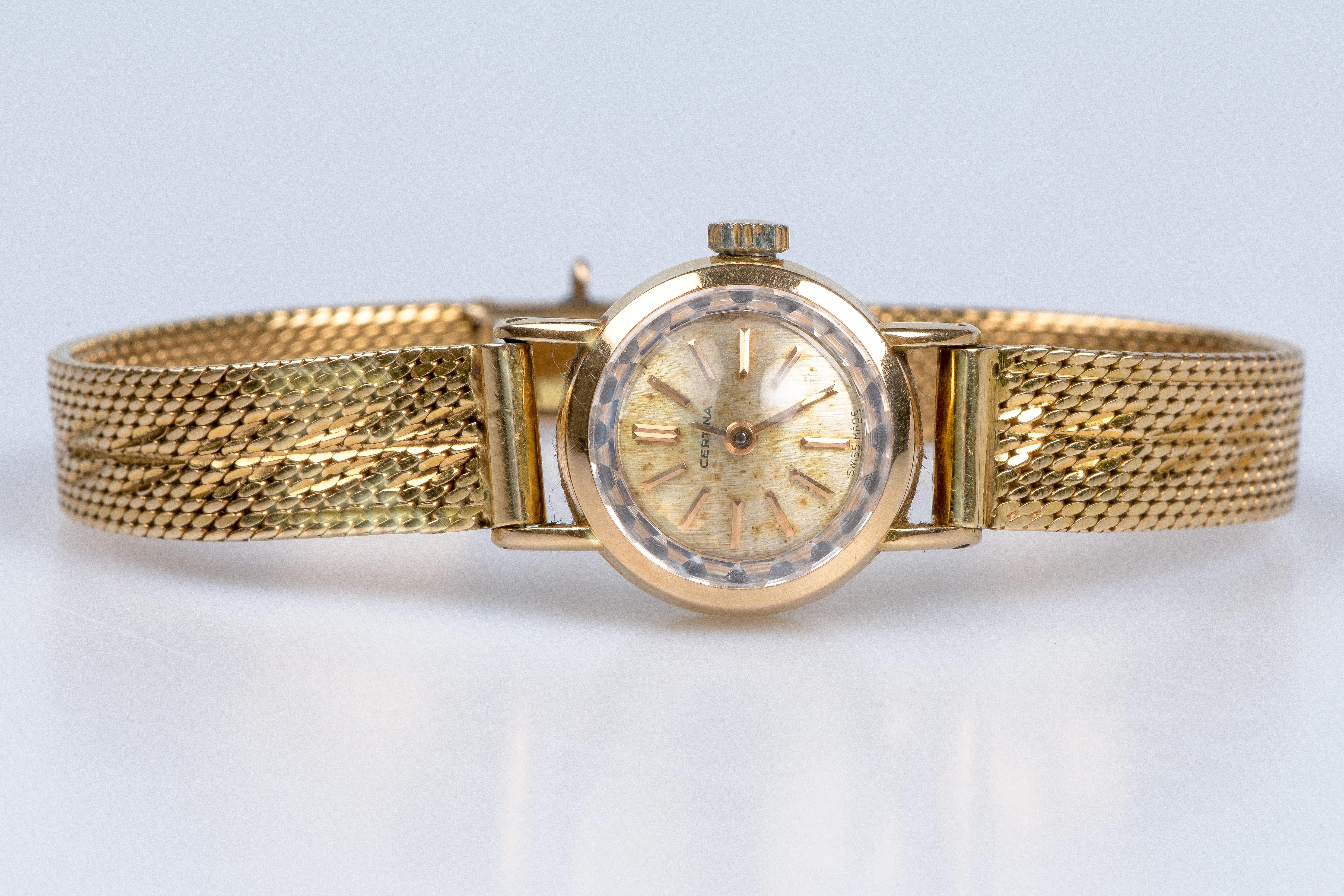 CERTINA's watch in 18carats yellow gold with a soft decorated fine mesh bracelet 1