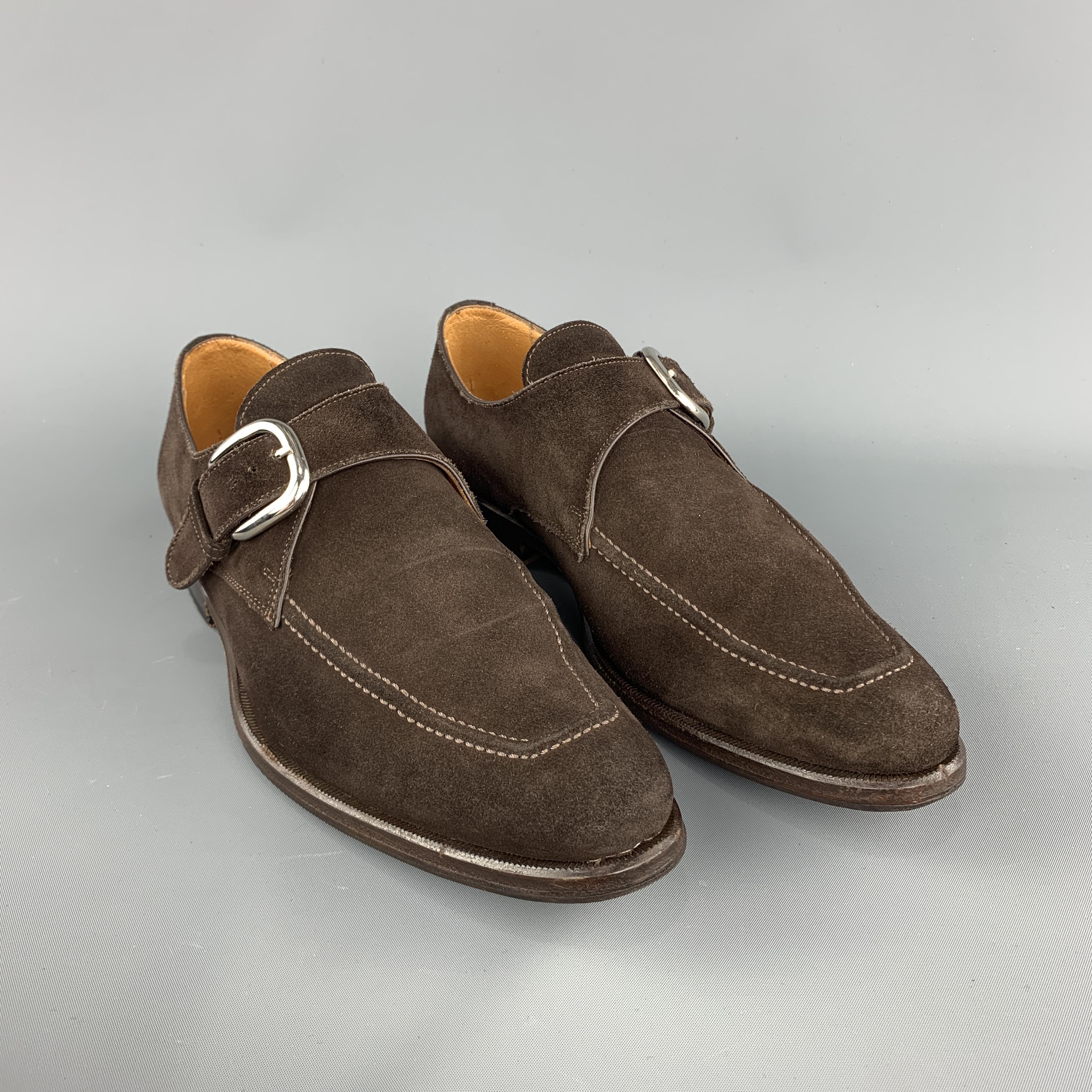 CERTO loafer comes in a brown suede featuring a monk strap style with silver tone buckle detail and a wooden sole. Handmade in Italy.
 
Excellent Pre-Owned Condition.
Marked: 40.5
 
Measurements:
 
Outsole: 12 in. x 4.5 in.