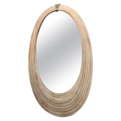 Miroir cérusé avec médaillon en bronze