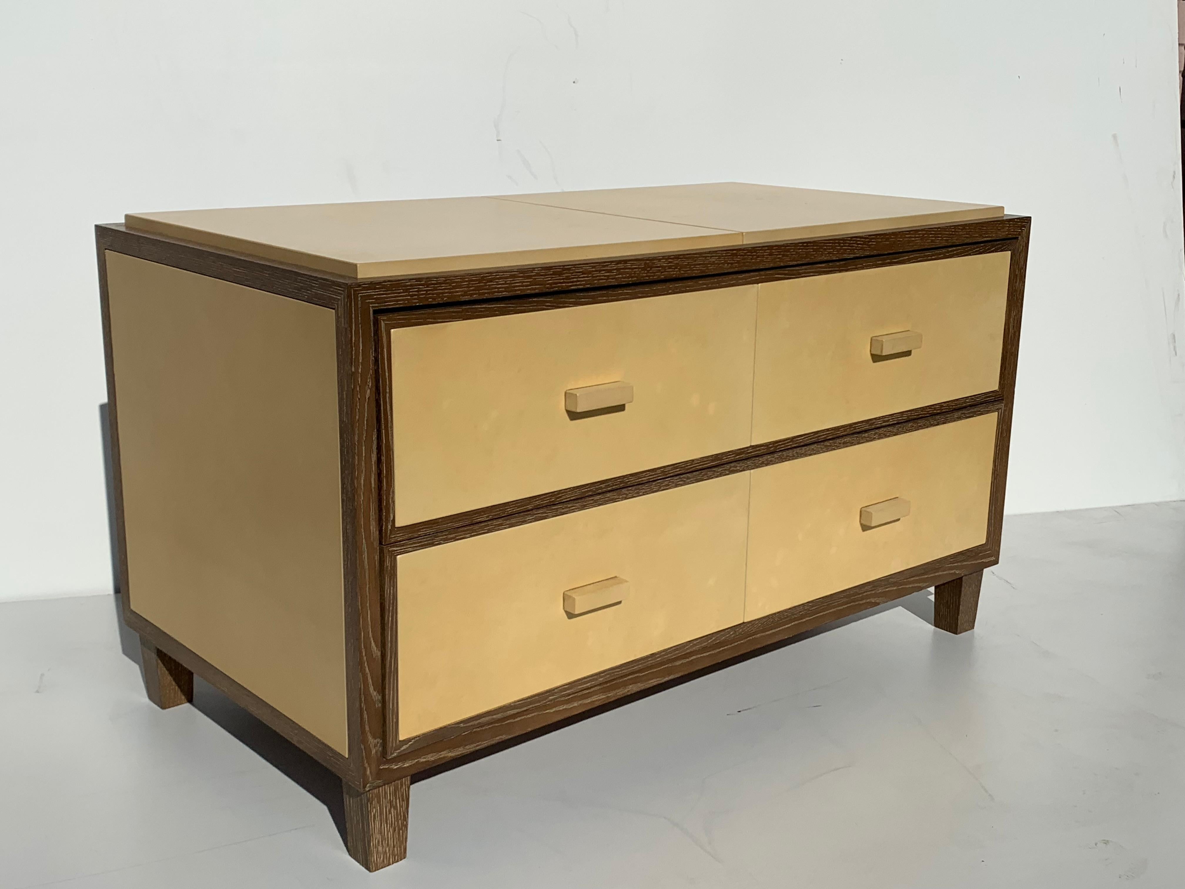 Cerused oak and parchment commode / dresser / nightstand with two large drawers. Measures: Inside each
drawer is 19